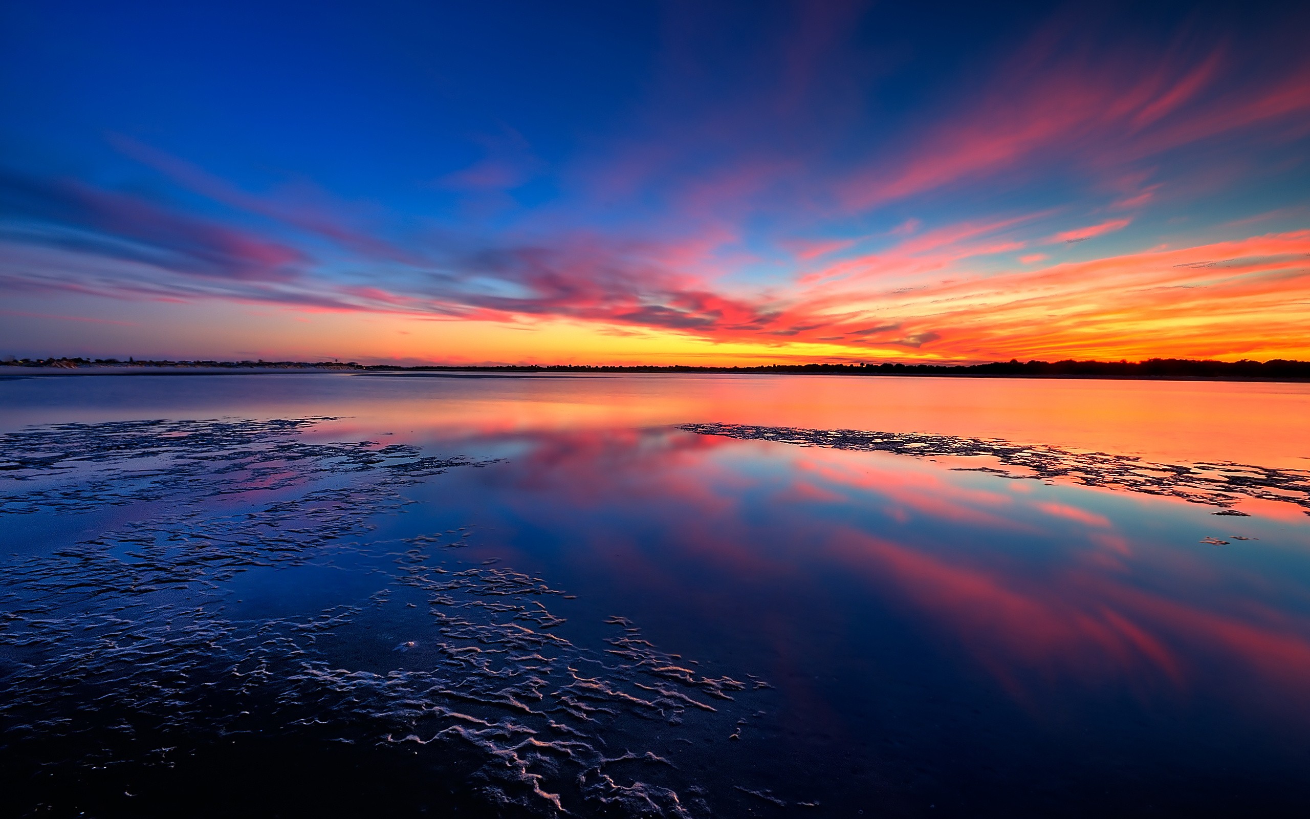 Sunset over a calm lake with colorful clouds HD Wallpaper