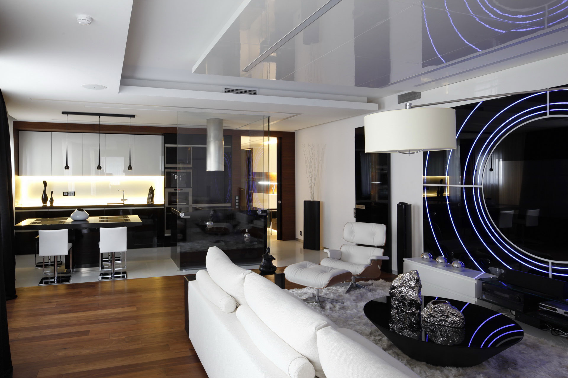Modern living room and kitchen with sleek design HD Wallpaper