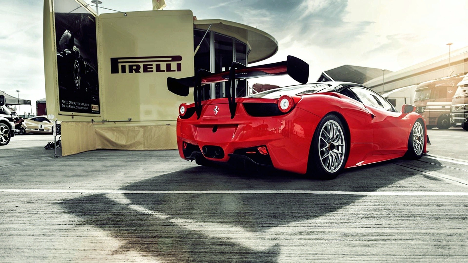 Red Ferrari 458 Italia with Pirelli Banner HD Wallpaper