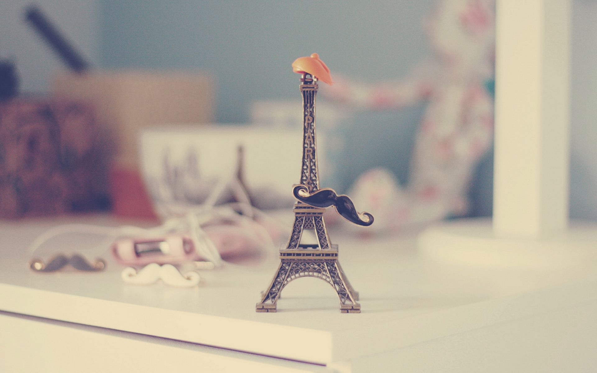 Miniature Eiffel Tower with mustache and hat HD Wallpaper
