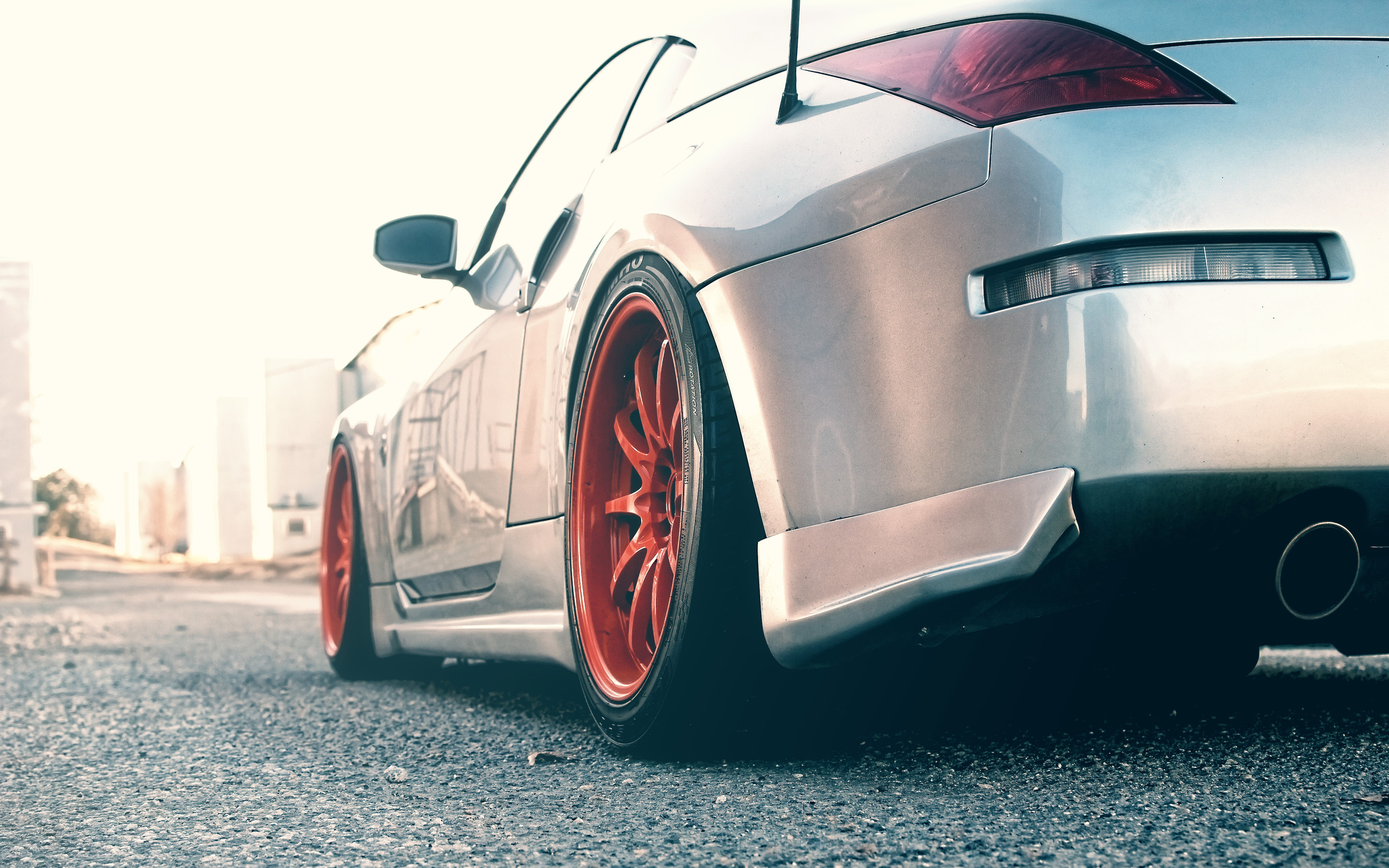 Nissan 350Z rear view with red rims HD Wallpaper