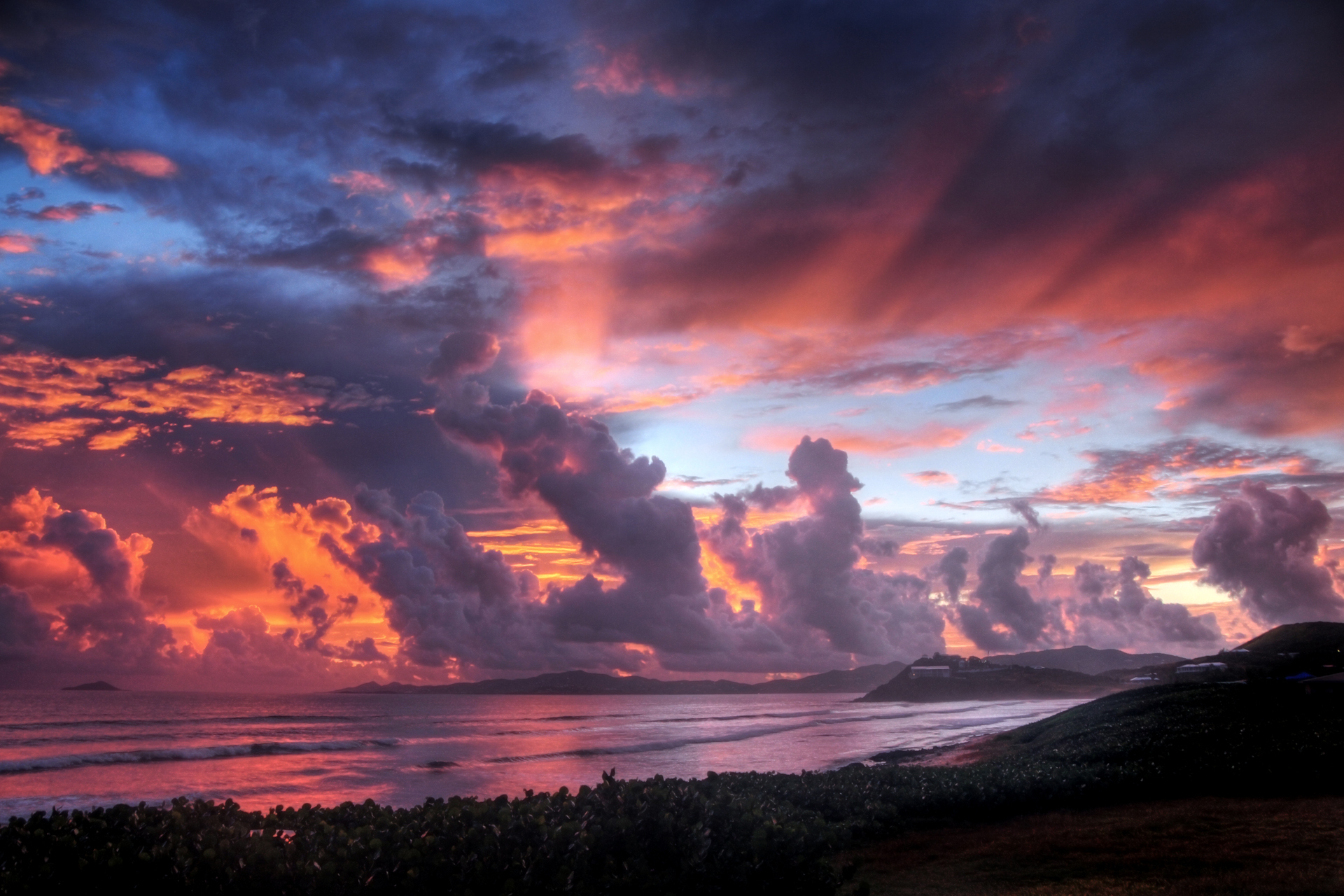 Dramatic sunset over the ocean with colorful clouds HD Wallpaper