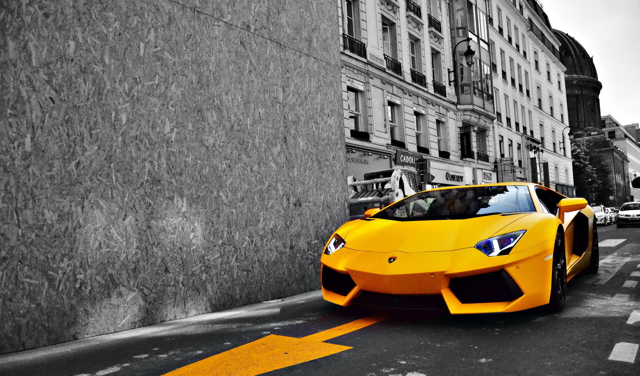 Yellow Lamborghini Aventador on a City Street HD Wallpaper