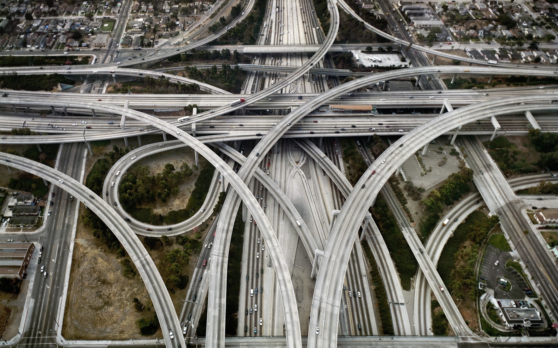 Aerial view of a complex highway interchange HD Wallpaper