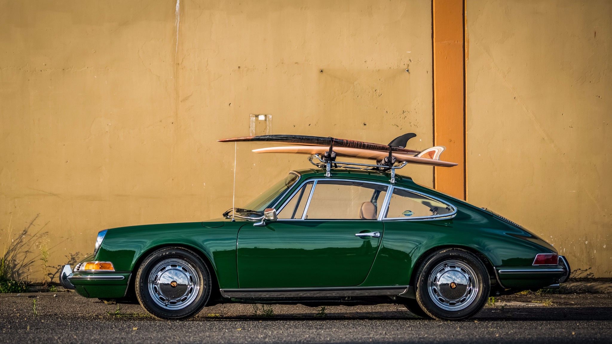 Green Porsche 912 with surfboards on roof rack HD Wallpaper
