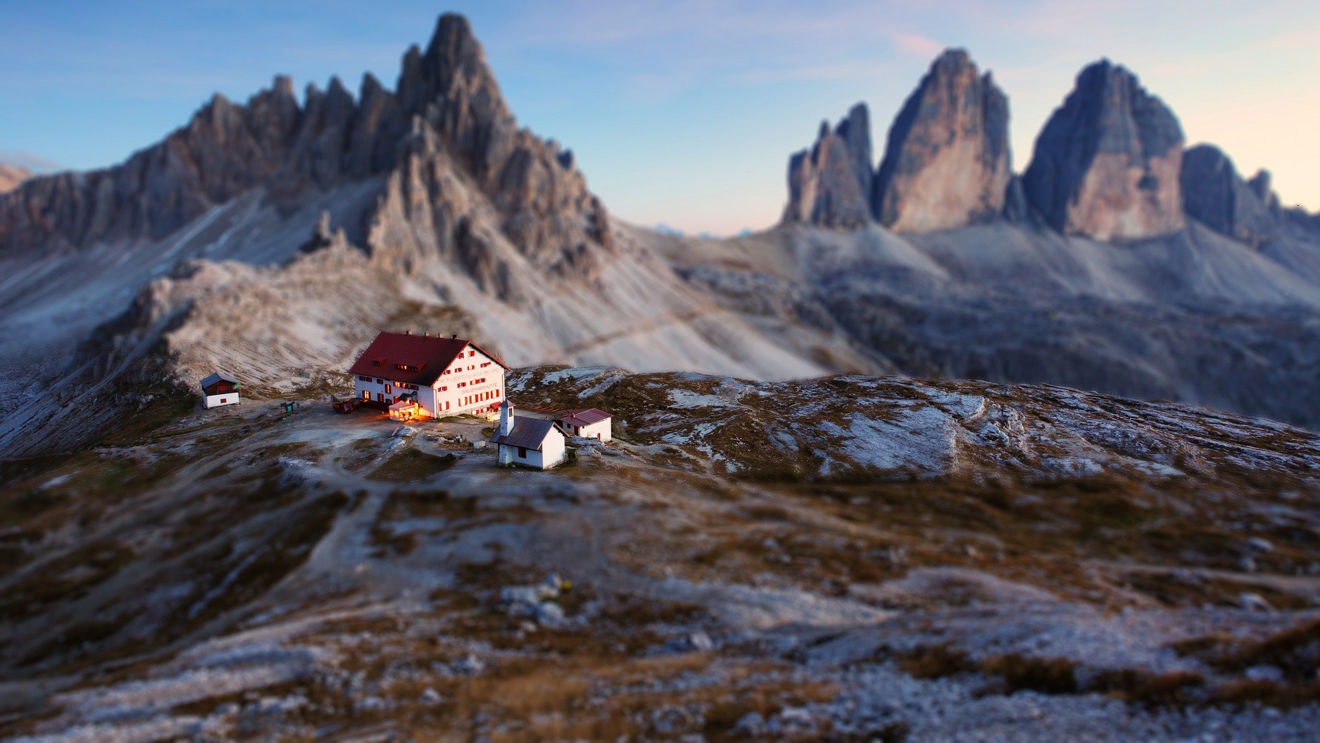 Mountain lodge with Tre Cime di Lavaredo peaks HD Wallpaper