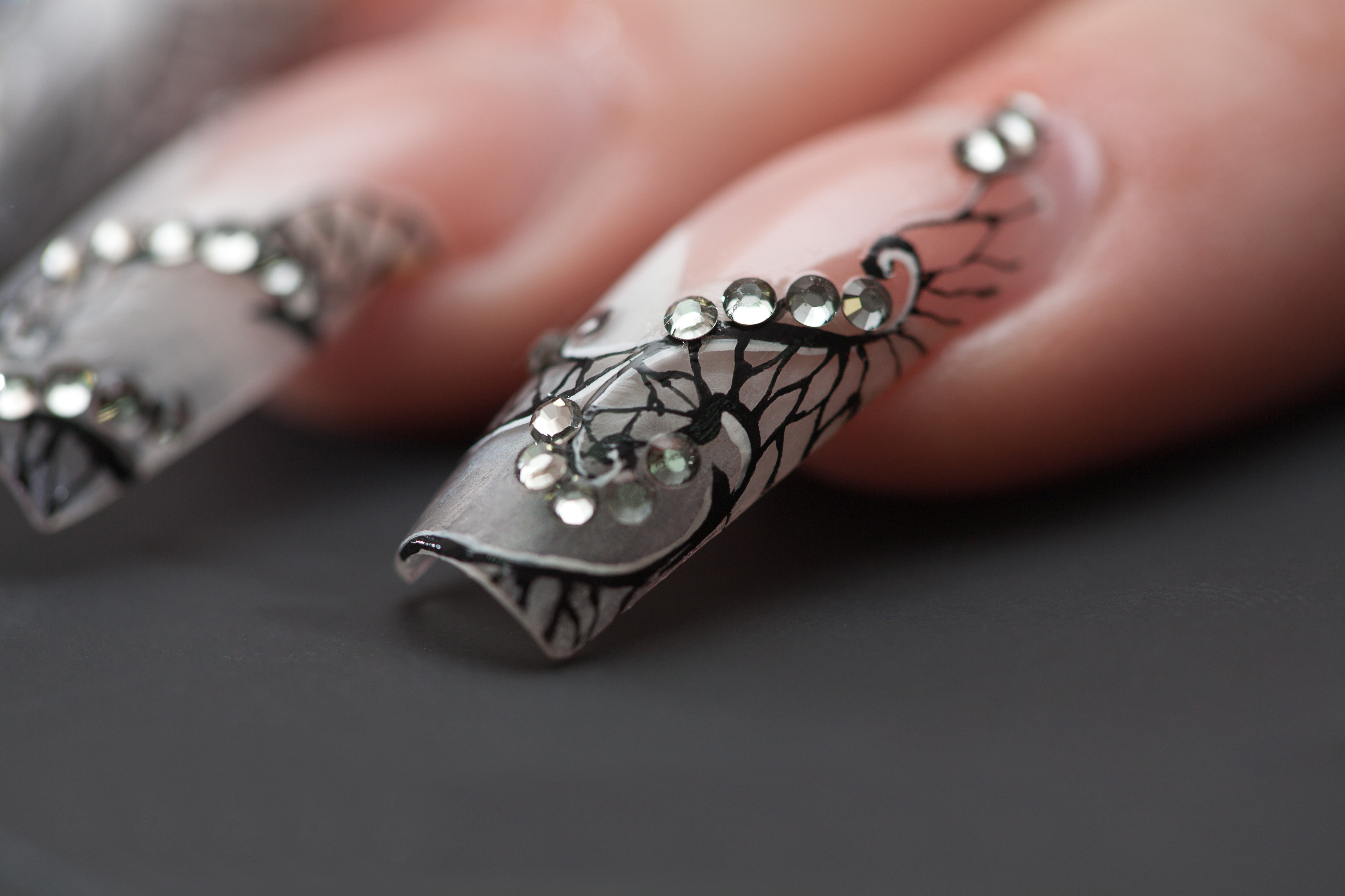 Woman's nails with rhinestones and black lace design HD Wallpaper