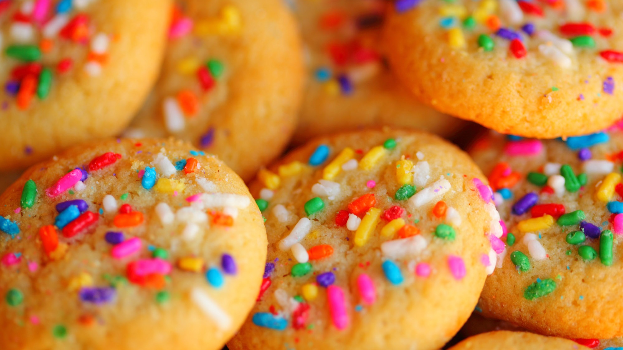 Close-up of colorful sprinkle cookies HD Wallpaper