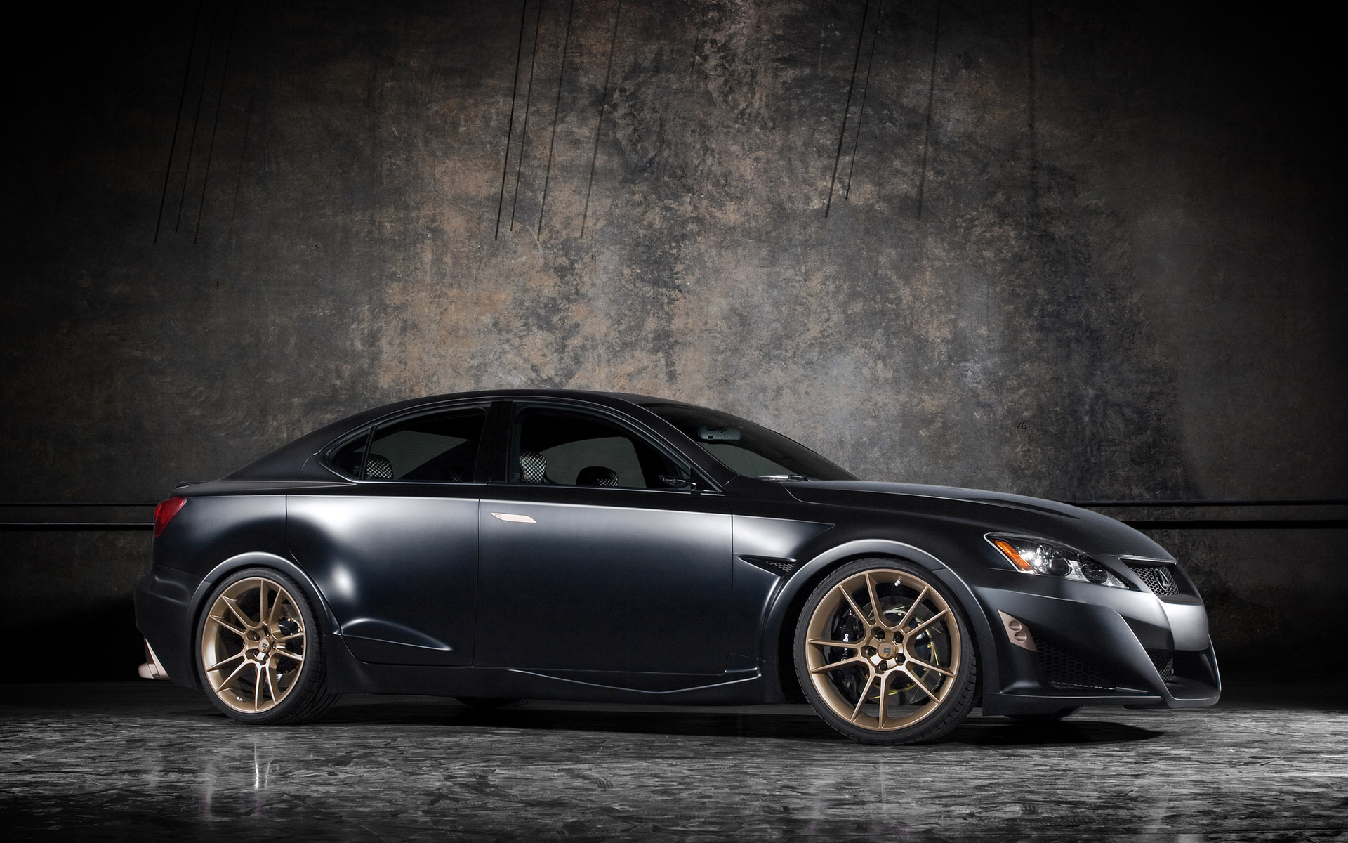 Matte black Lexus IS sedan with gold wheels HD Wallpaper