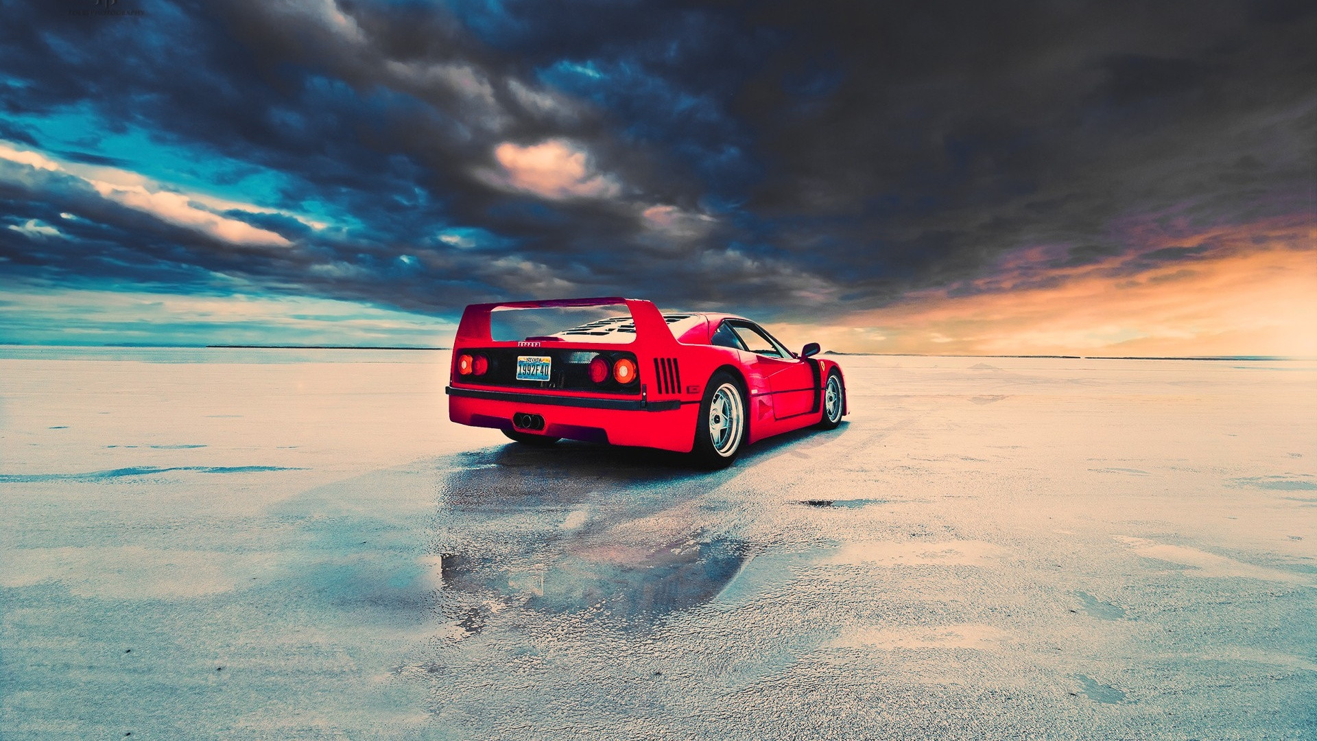 Red Ferrari F40 on a wet salt flat HD Wallpaper
