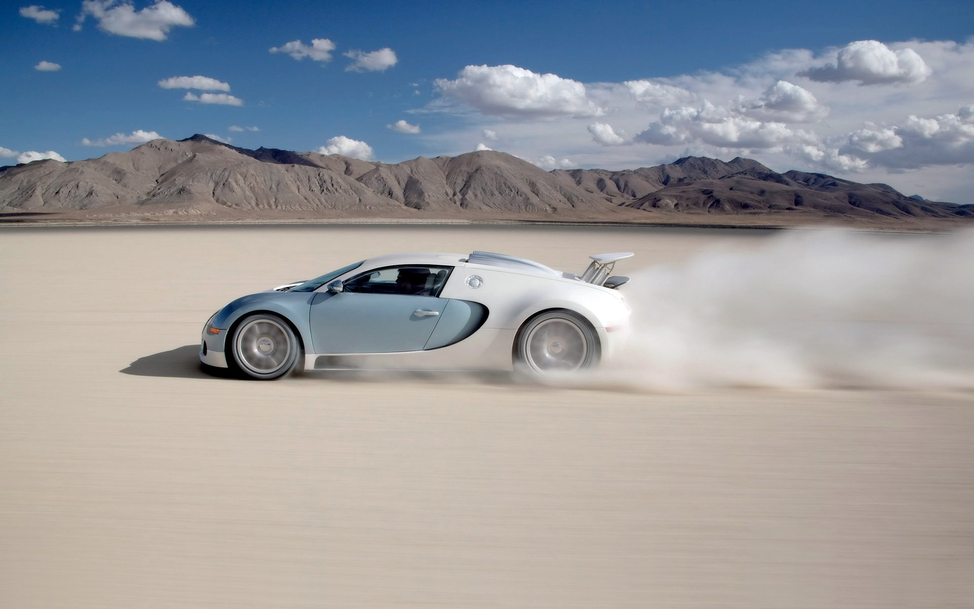 Bugatti Veyron drifting on a dry lake bed HD Wallpaper