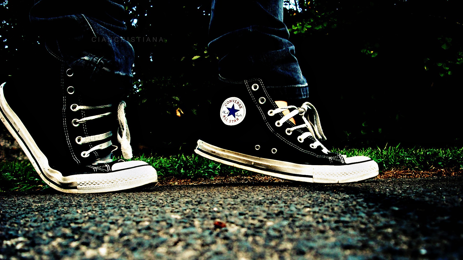 Person wearing black Converse All-Star sneakers HD Wallpaper