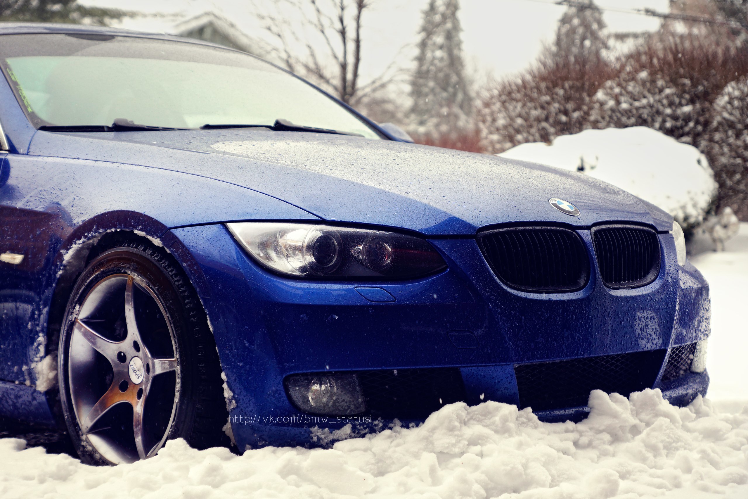 Blue BMW car in snow HD Wallpaper