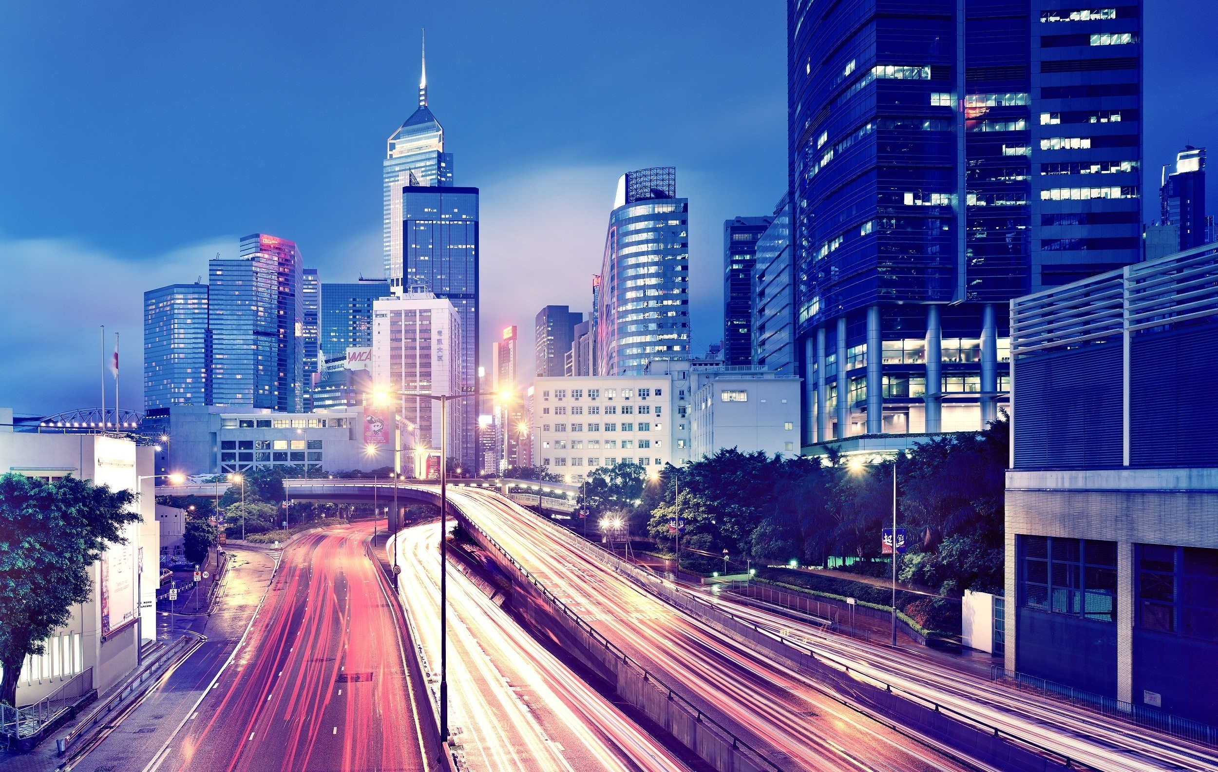 Hong Kong cityscape with light trails at night HD Wallpaper