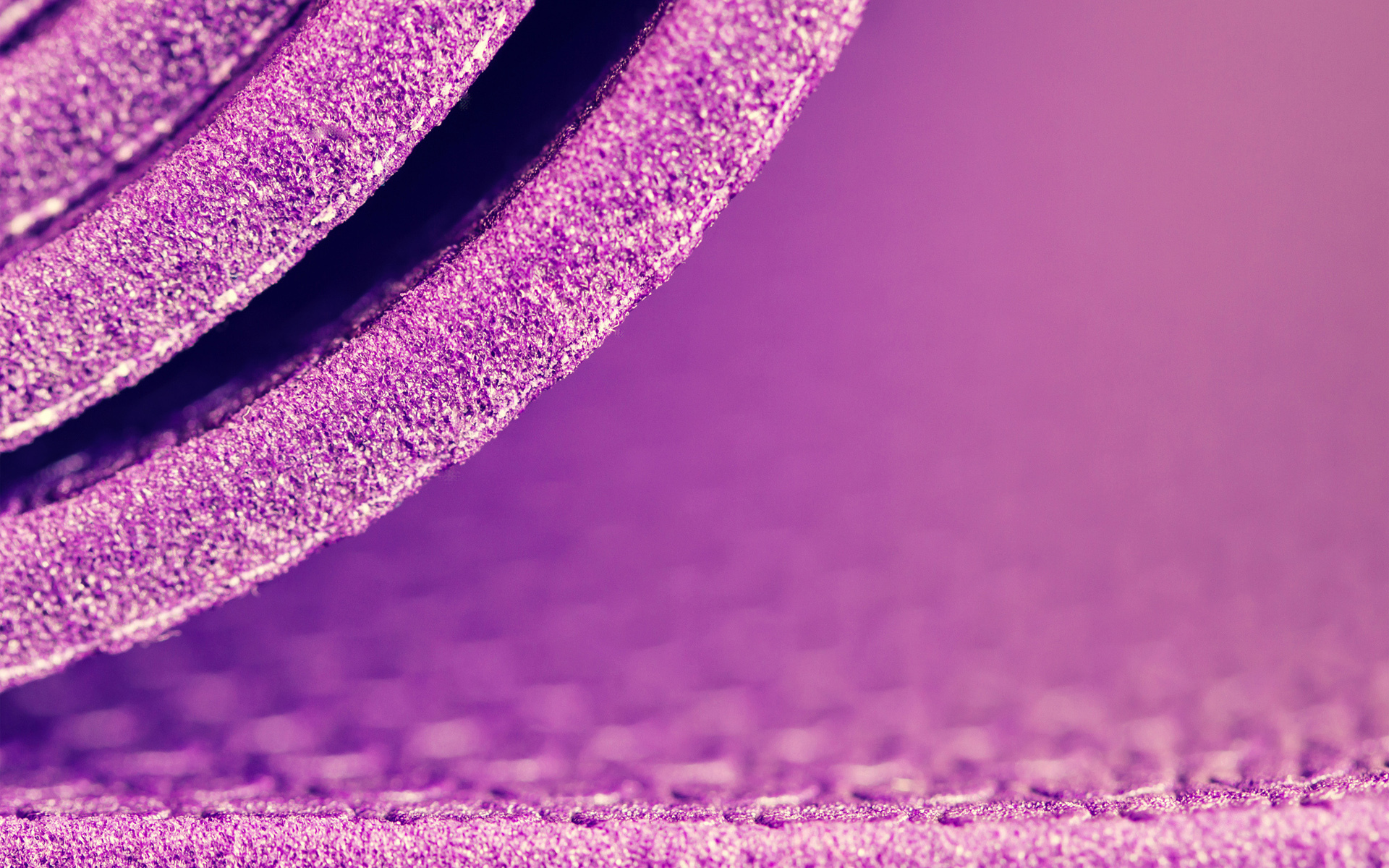 Close-up of a rolled purple yoga mat HD Wallpaper