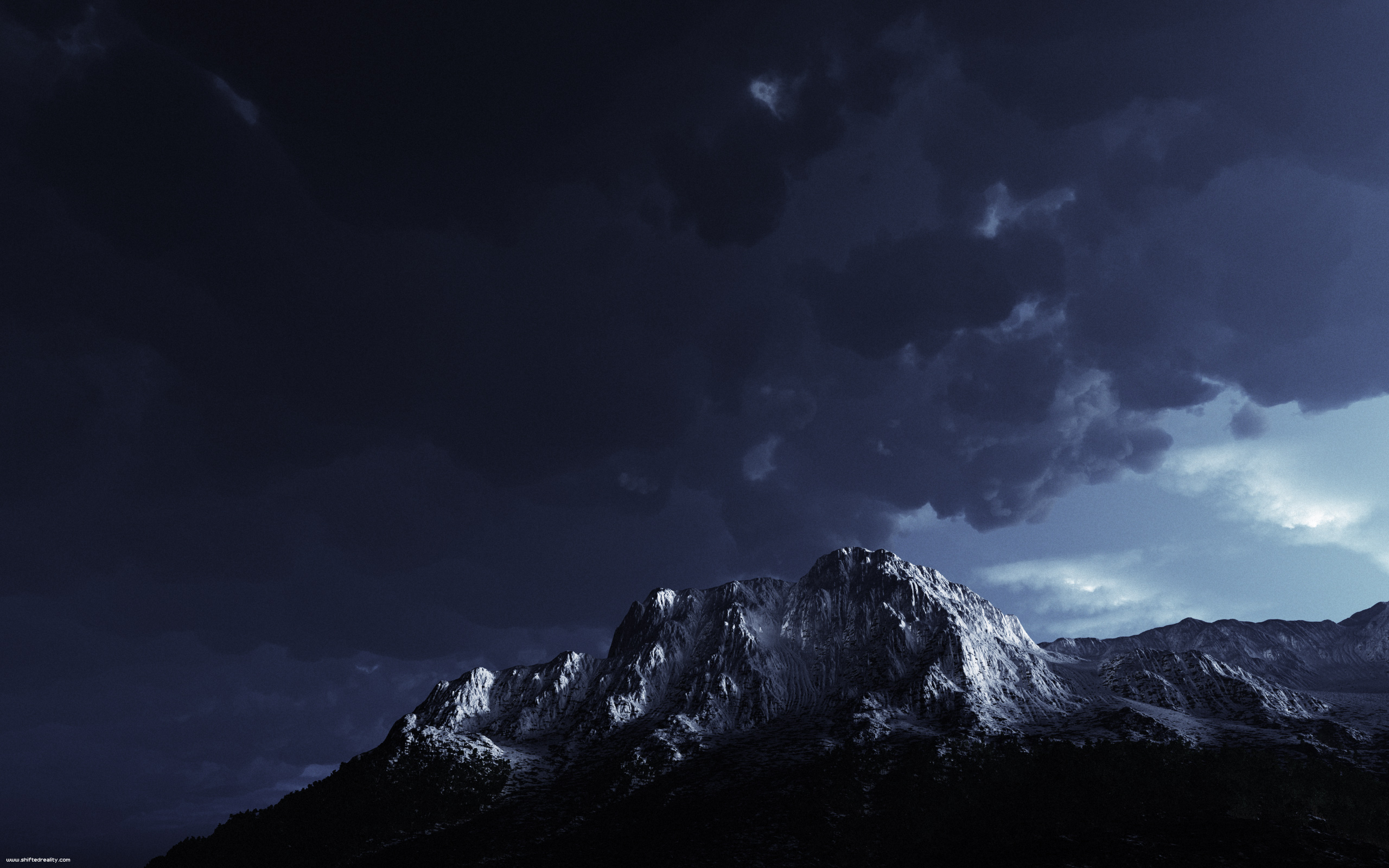Dark stormy clouds over a snow-capped mountain range HD Wallpaper