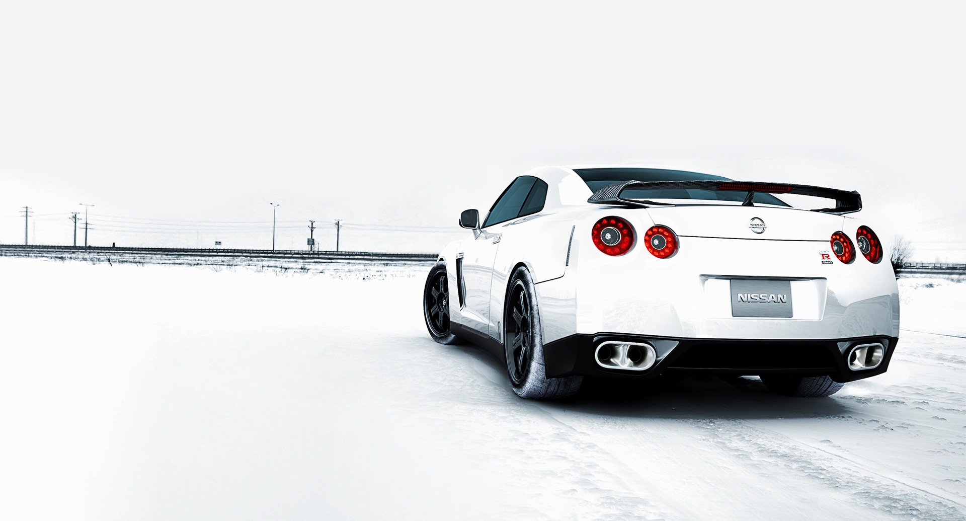 White Nissan GT-R in a Snowy Landscape HD Wallpaper