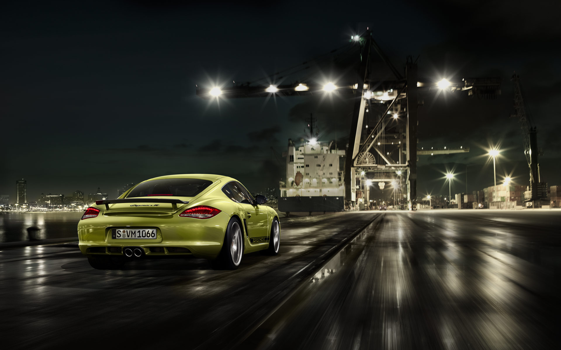 Yellow Porsche Cayman R at a Port at Night HD Wallpaper