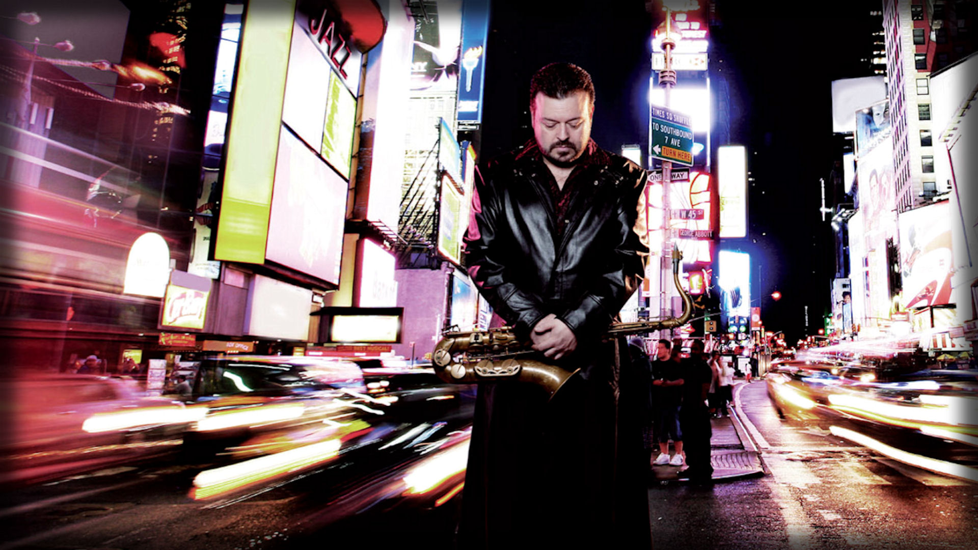 Jaared with Saxophone in Times Square at Night HD Wallpaper