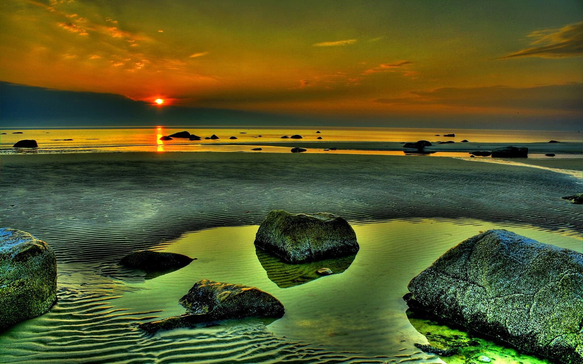Sunset over a rocky beach with tide pools HD Wallpaper