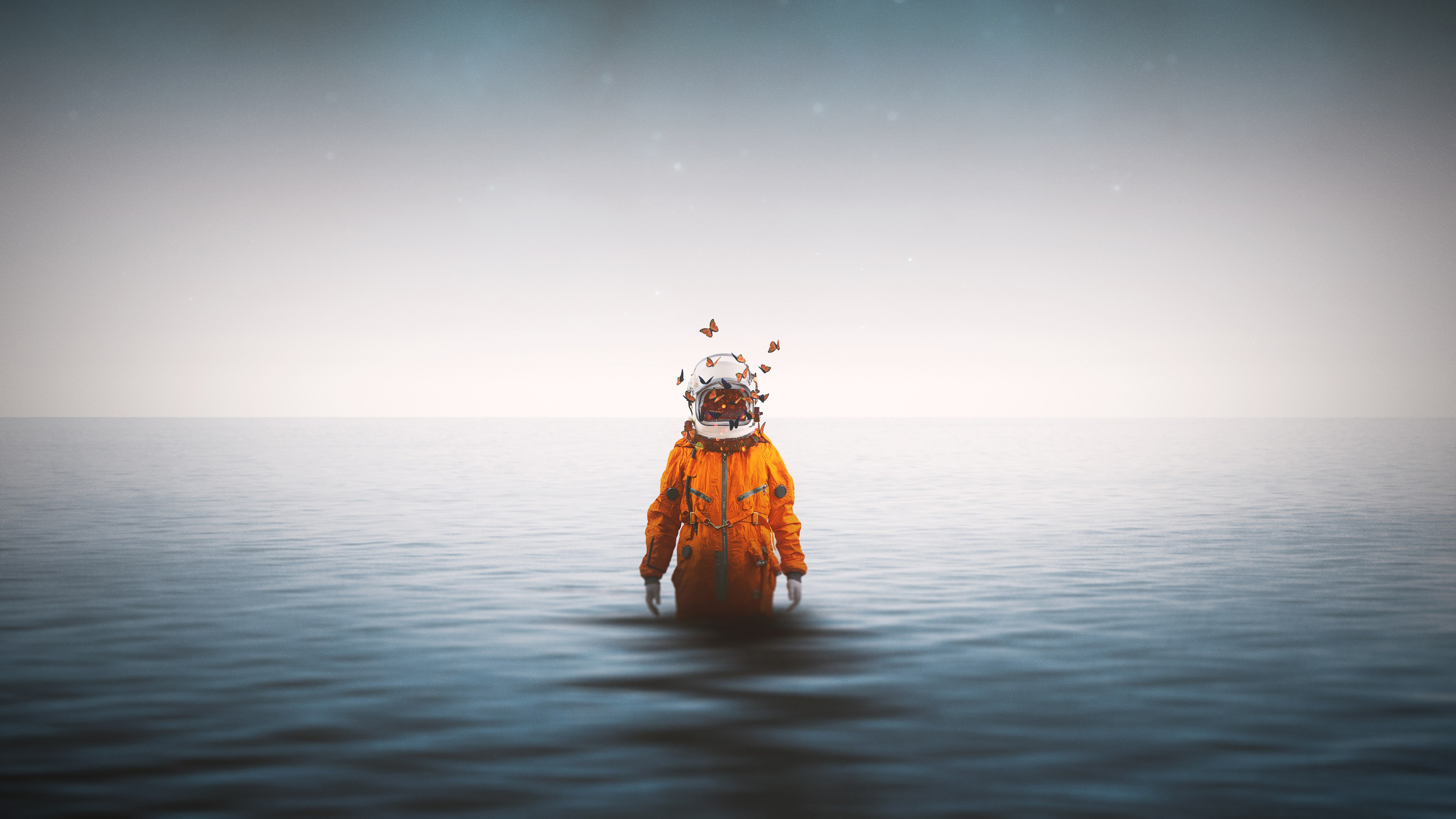 Astronaut with butterflies in the ocean 4K HD Wallpaper