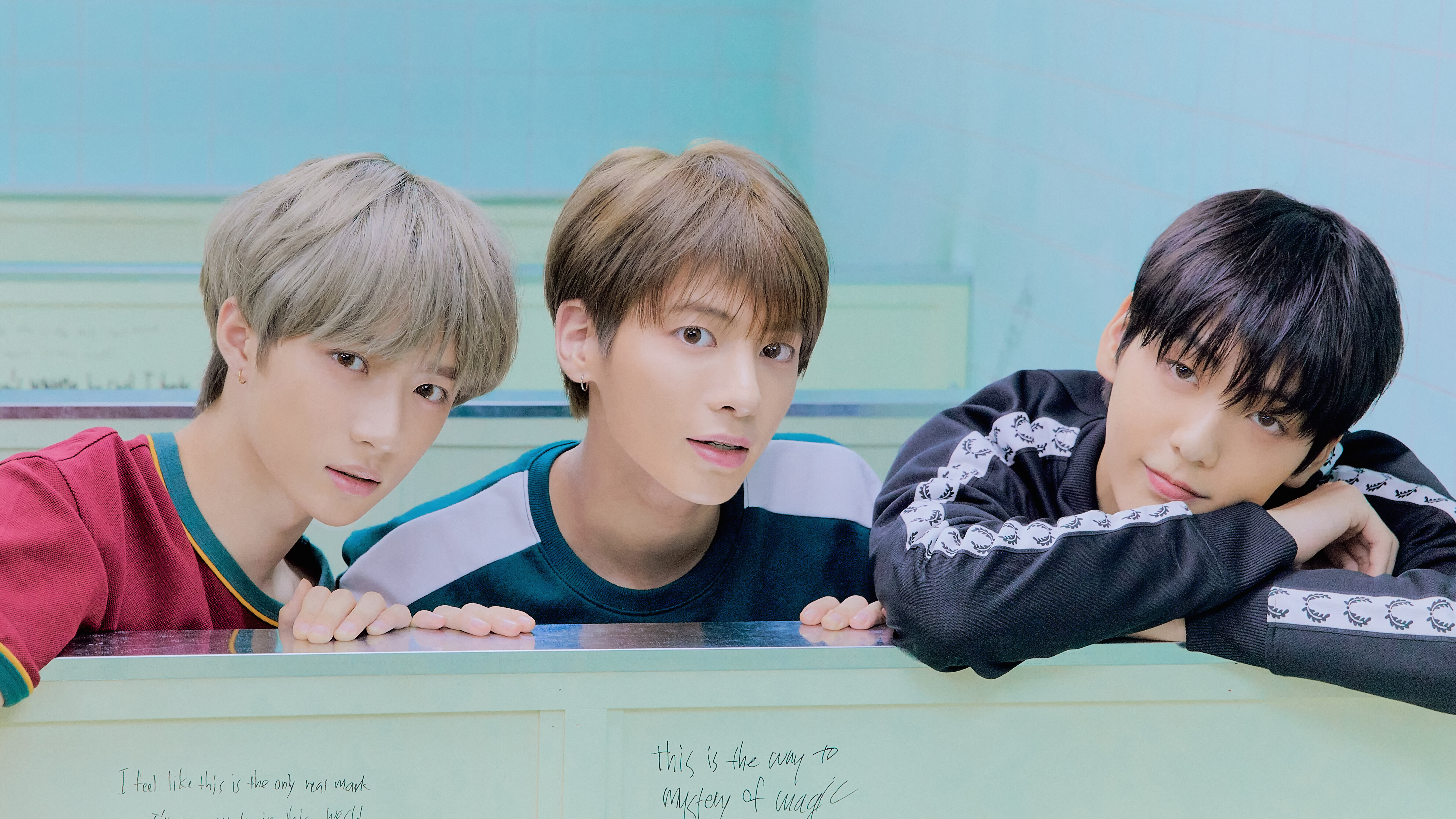 Three young men posing for a photo HD Wallpaper
