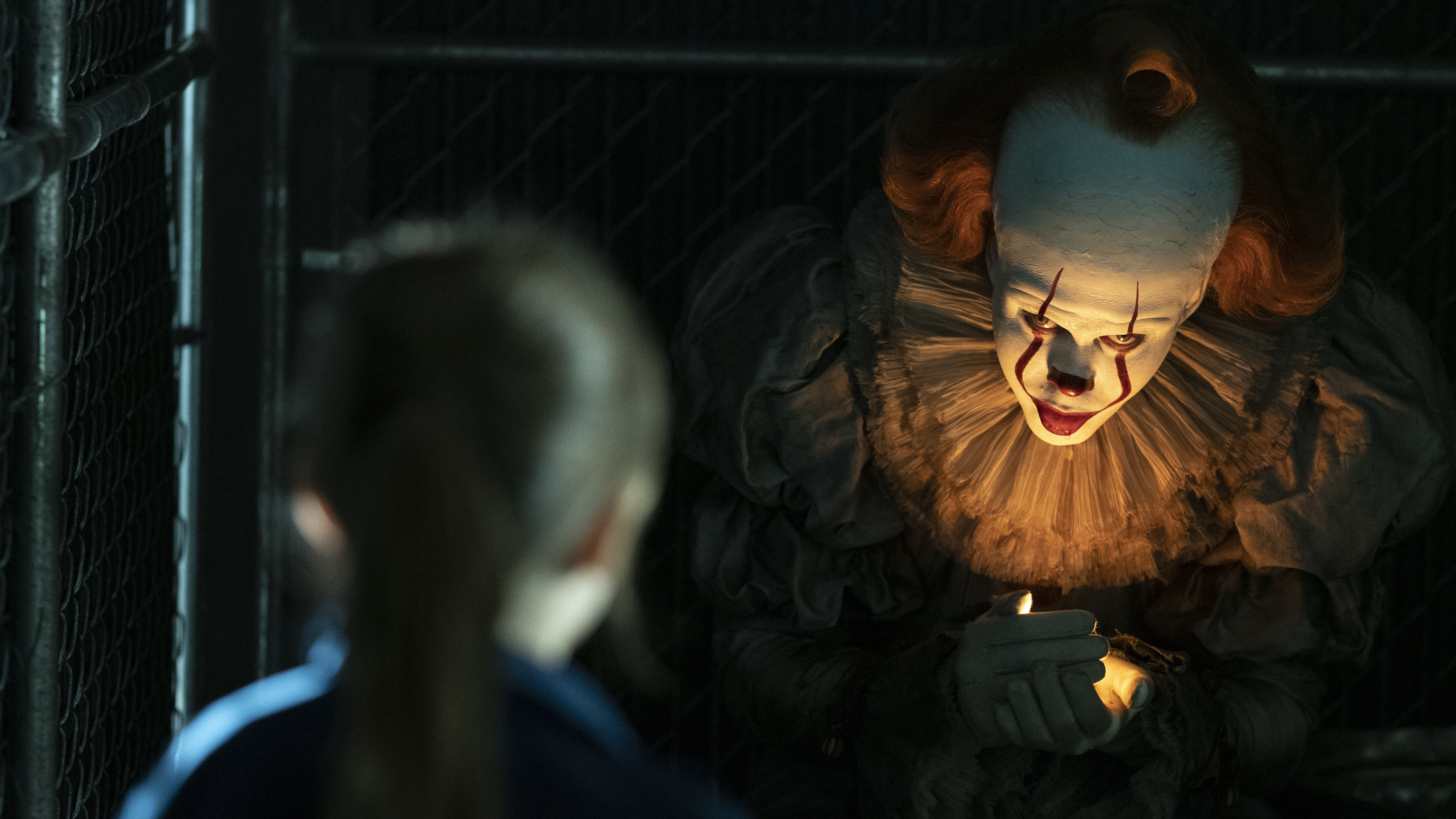 Pennywise the Dancing Clown from It holding a light HD Wallpaper
