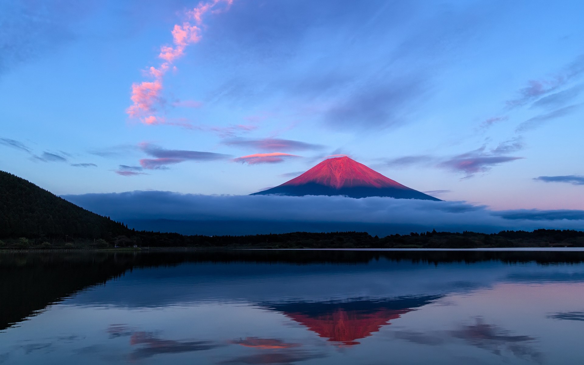 Mount Fuji reflected in a lake at sunrise HD Wallpaper