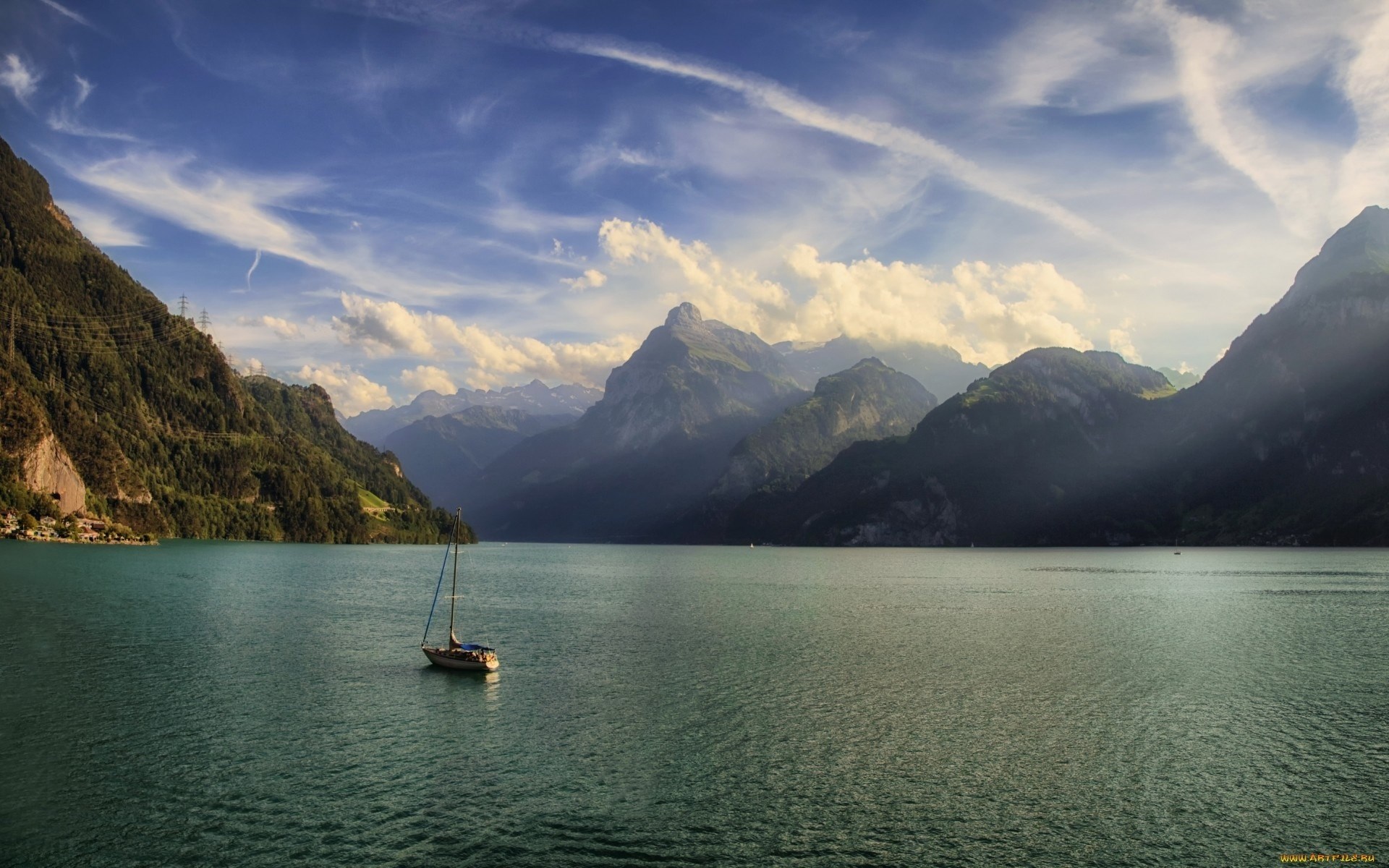 Sailboat on a lake with mountains and clouds HD Wallpaper