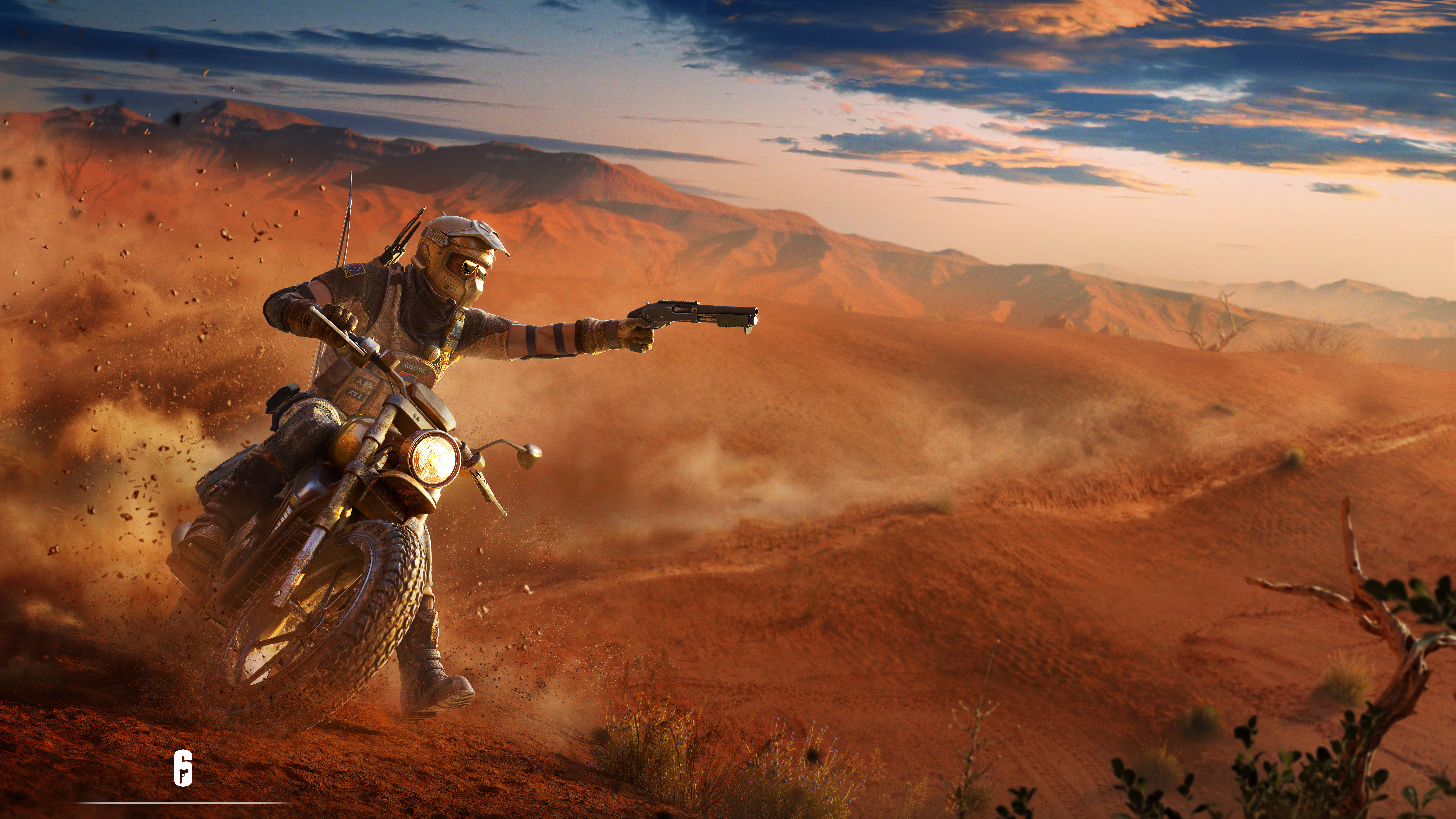 Man on motorcycle firing gun in desert HD Wallpaper