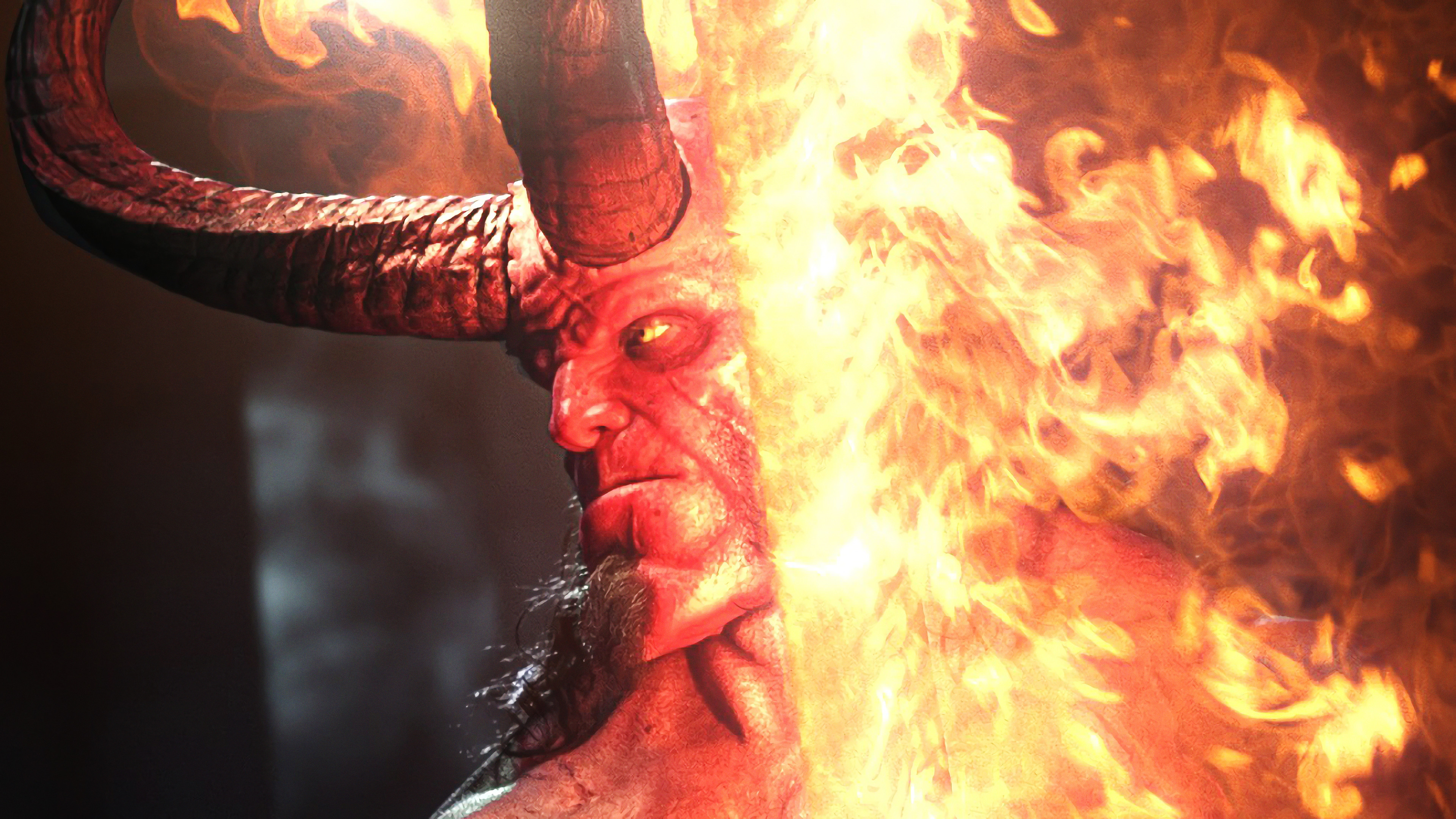 Hellboy with flaming right hand 4K HD Wallpaper