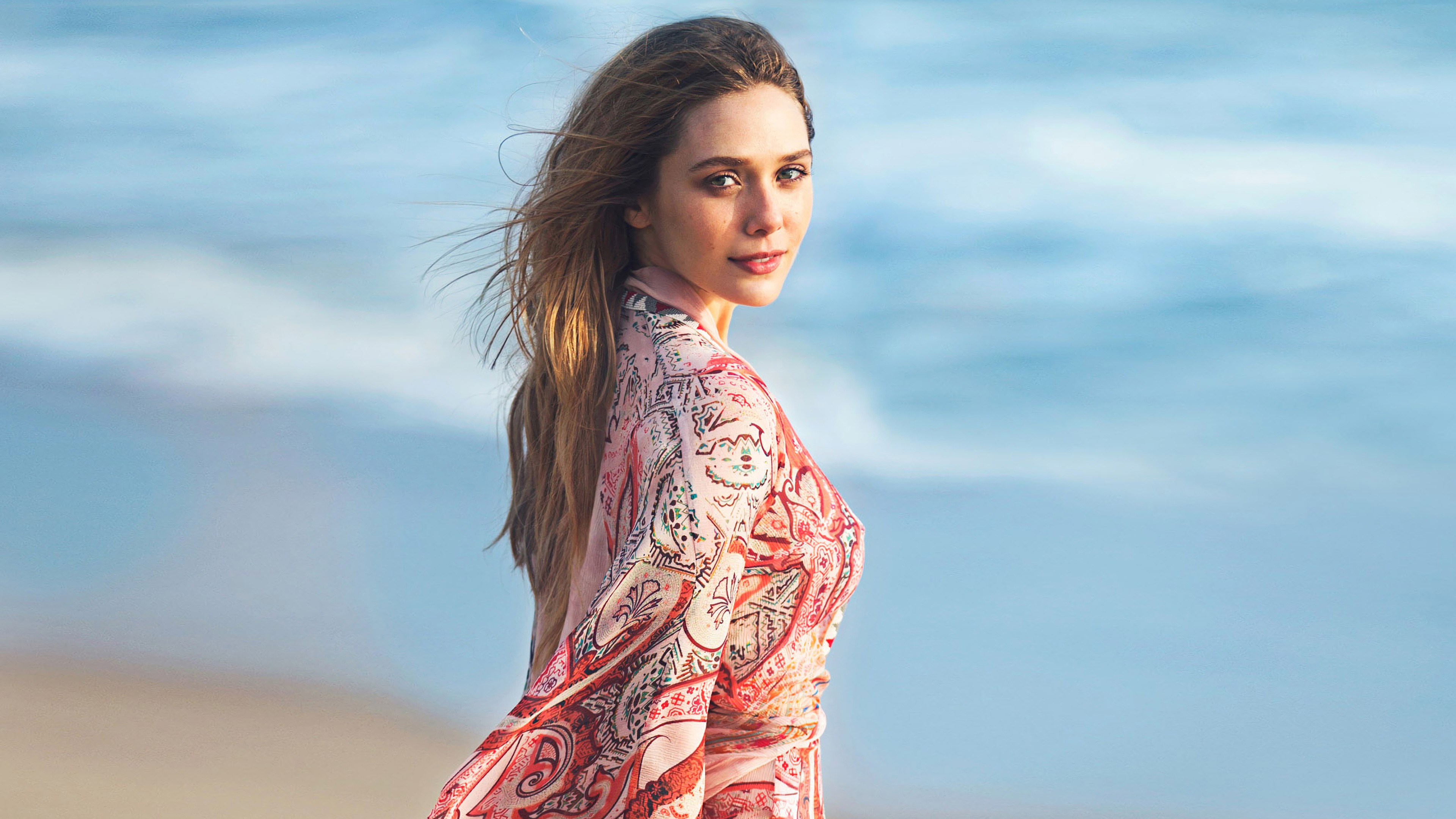 Elizabeth Olsen on a beach 4K HD Wallpaper