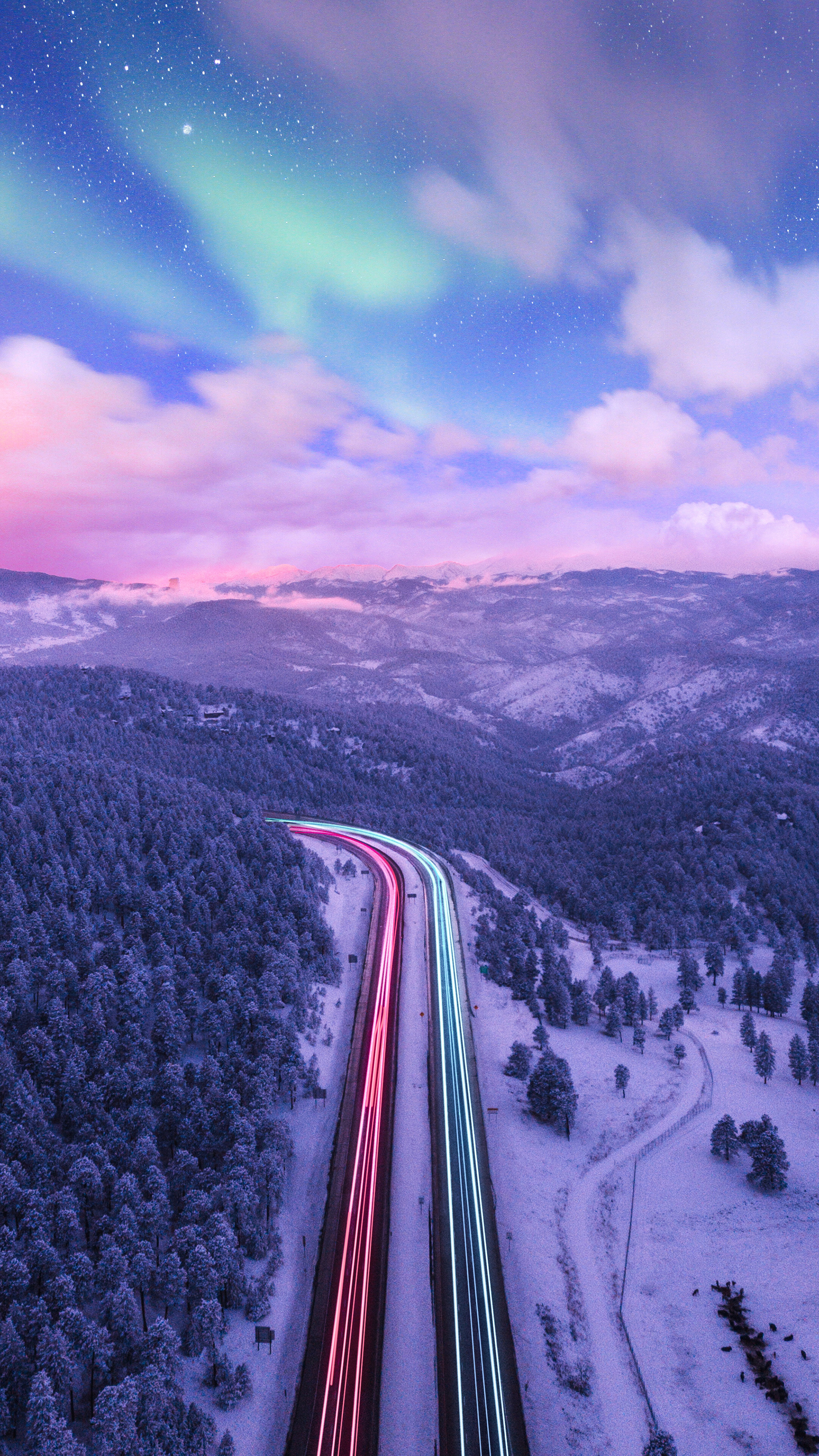 Aurora Borealis Over Snowy Mountains and Highway Light Trails HD Phone Wallpaper