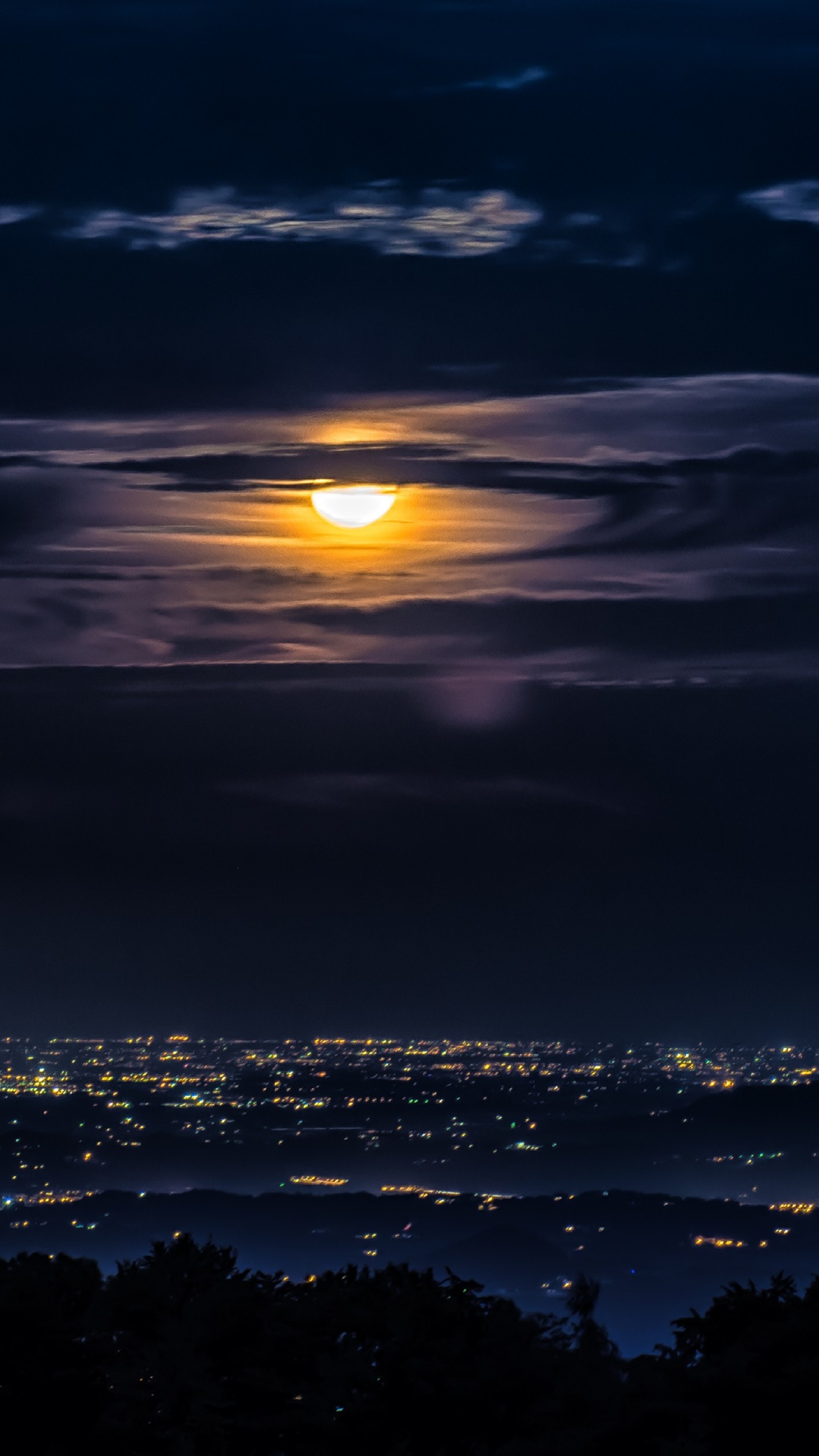 Moonlit Cityscape with Clouds HD Phone Wallpaper