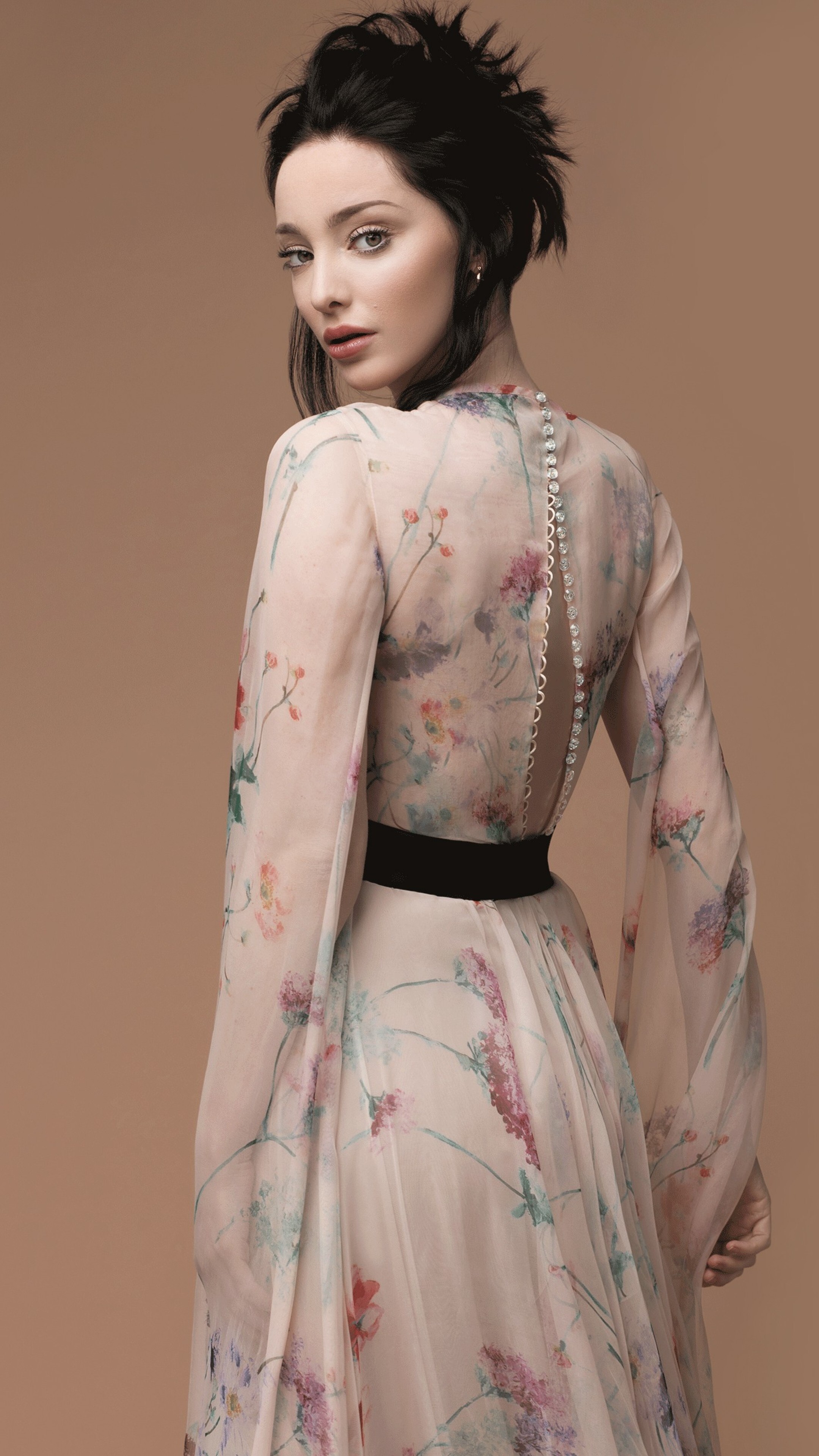 Emma Dumont in floral dress 4K HD Phone Wallpaper