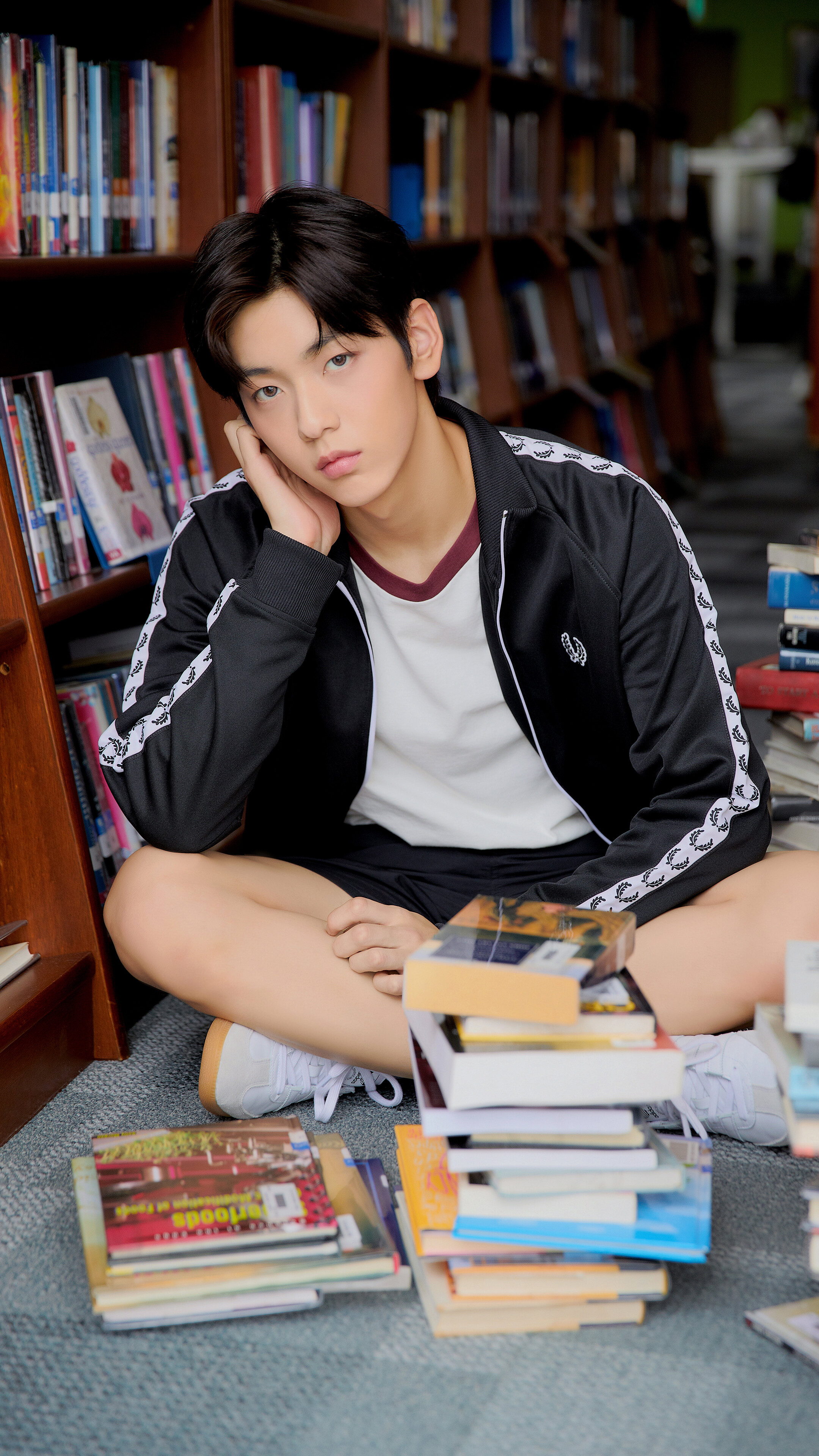 Soobin from TXT in a library HD Phone Wallpaper
