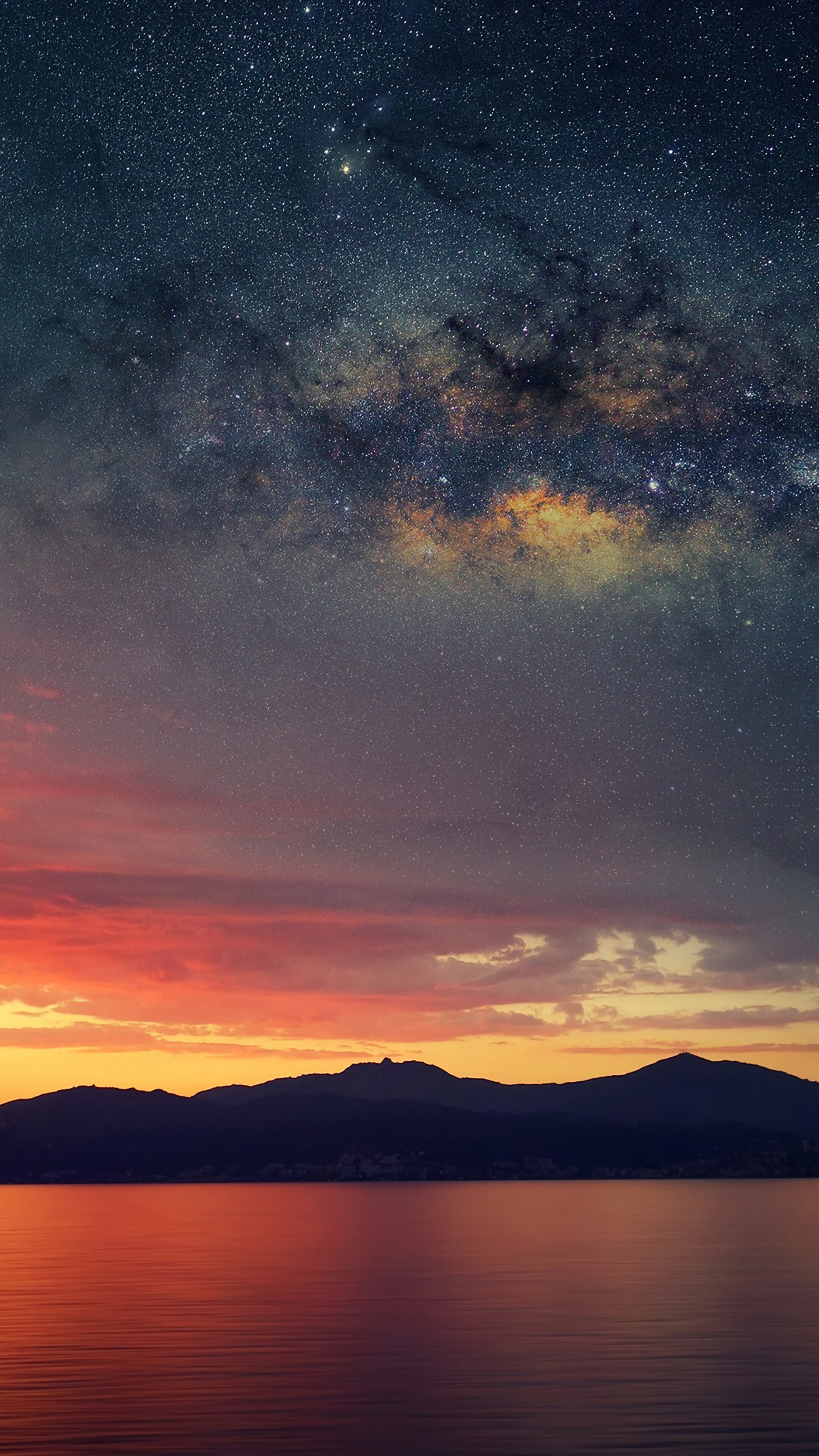 Milky Way over a lake at sunset HD Phone Wallpaper