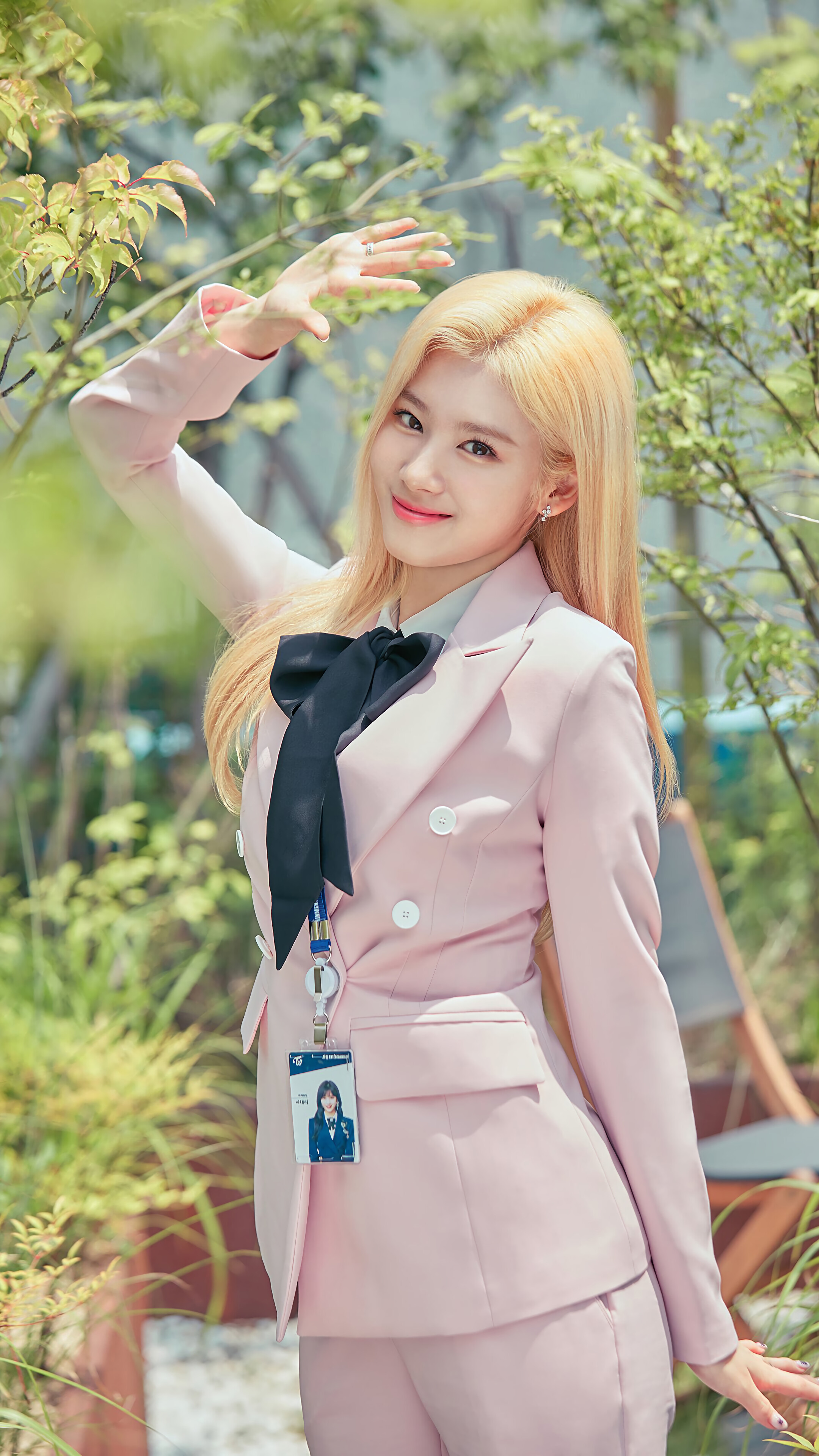Sana from TWICE in a pink suit HD Phone Wallpaper