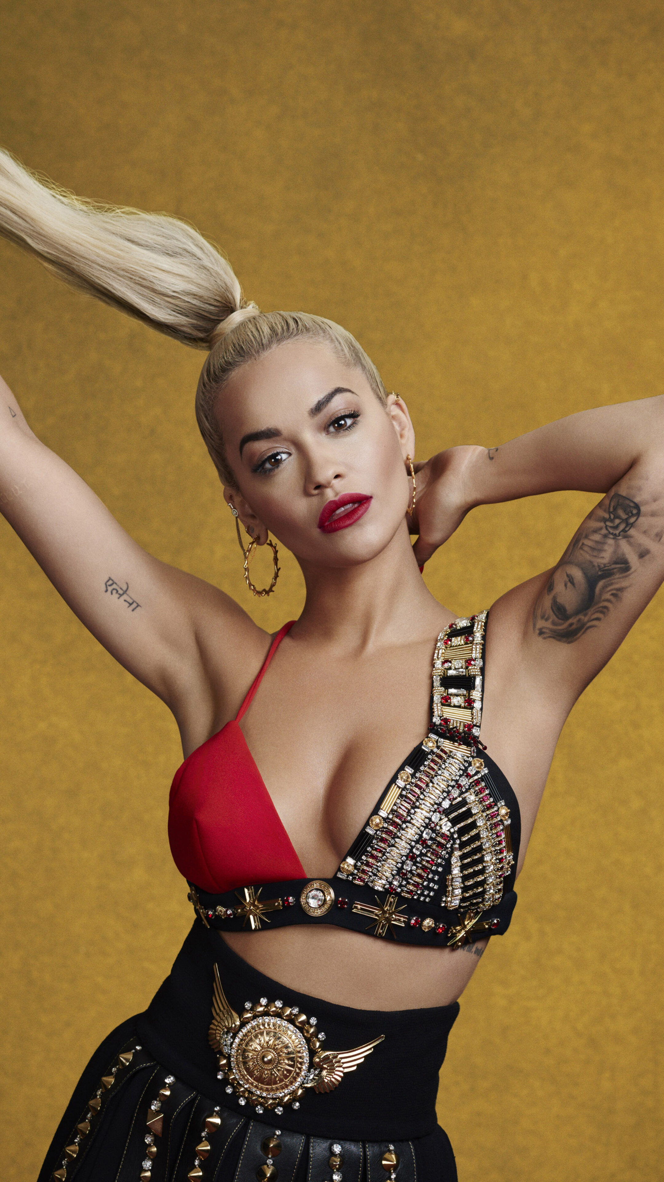 Rita Ora in a red and black outfit HD Phone Wallpaper