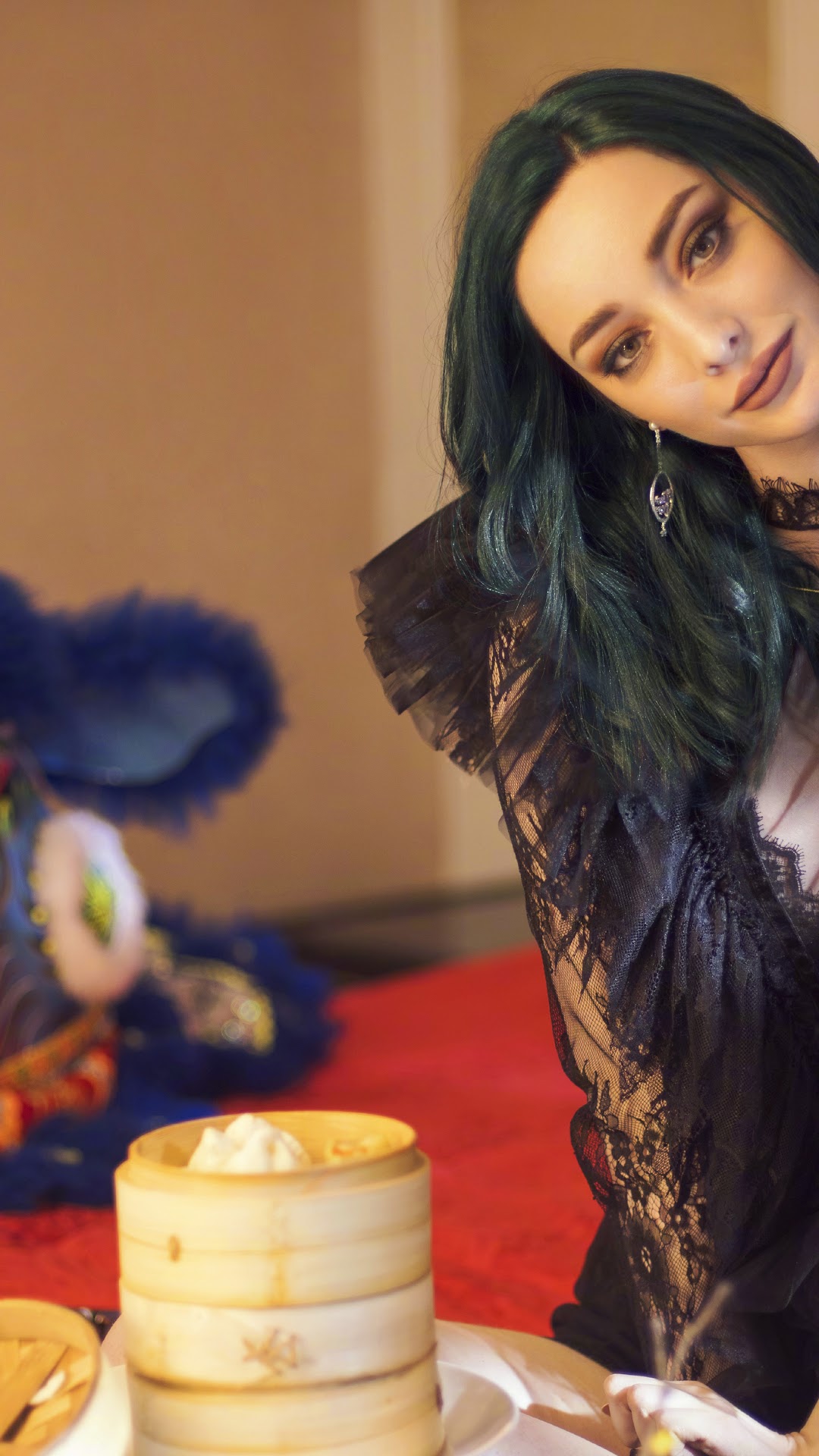 Emma Dumont in black lace dress with dim sum HD Phone Wallpaper