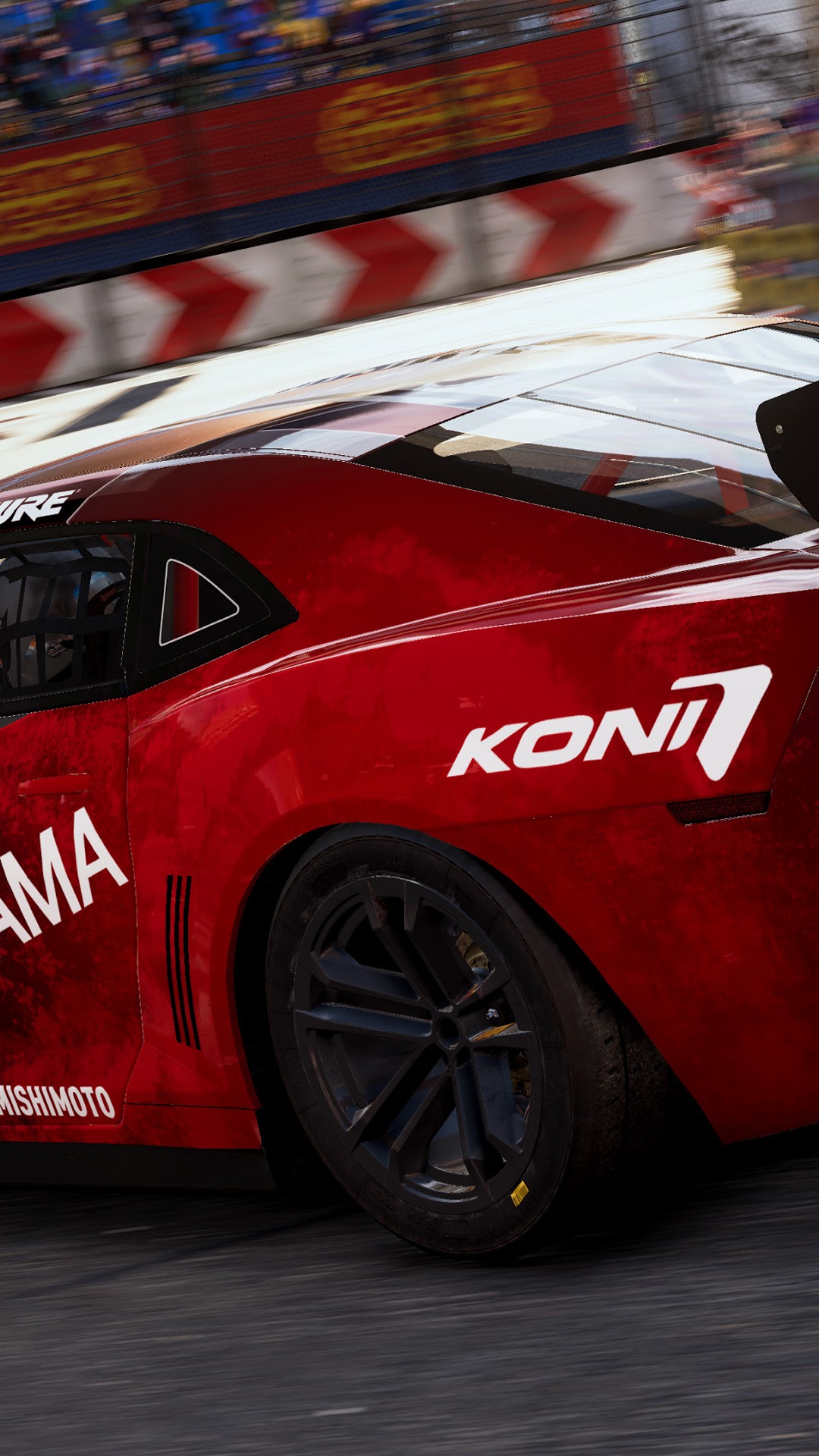 Red racing car with KONI and YAMAHA logos on track HD Phone Wallpaper