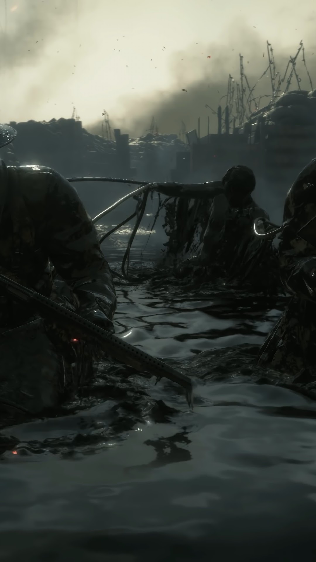 Soldiers in a desolate, muddy landscape in Death Stranding HD Phone Wallpaper