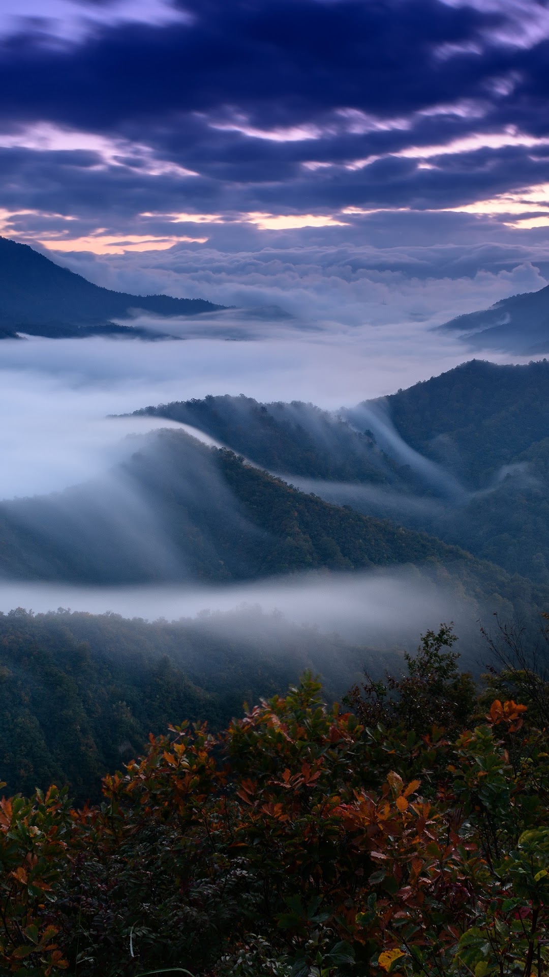 Misty mountains at sunrise with purple clouds HD Phone Wallpaper