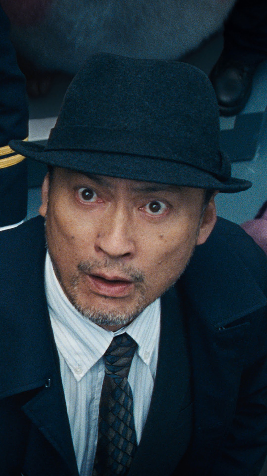 Detective Yoshida from Pokemon: Detective Pikachu HD Phone Wallpaper