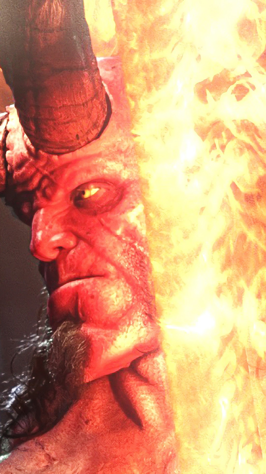 Hellboy with a flaming sword HD Phone Wallpaper