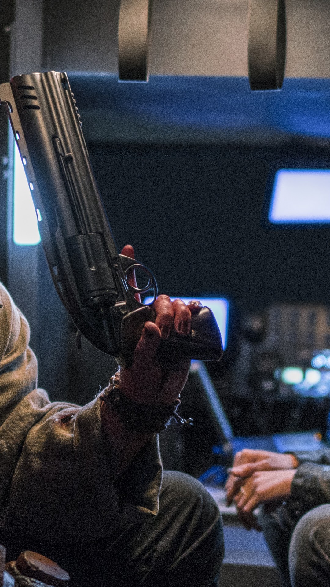Hellboy holding a gun HD Phone Wallpaper