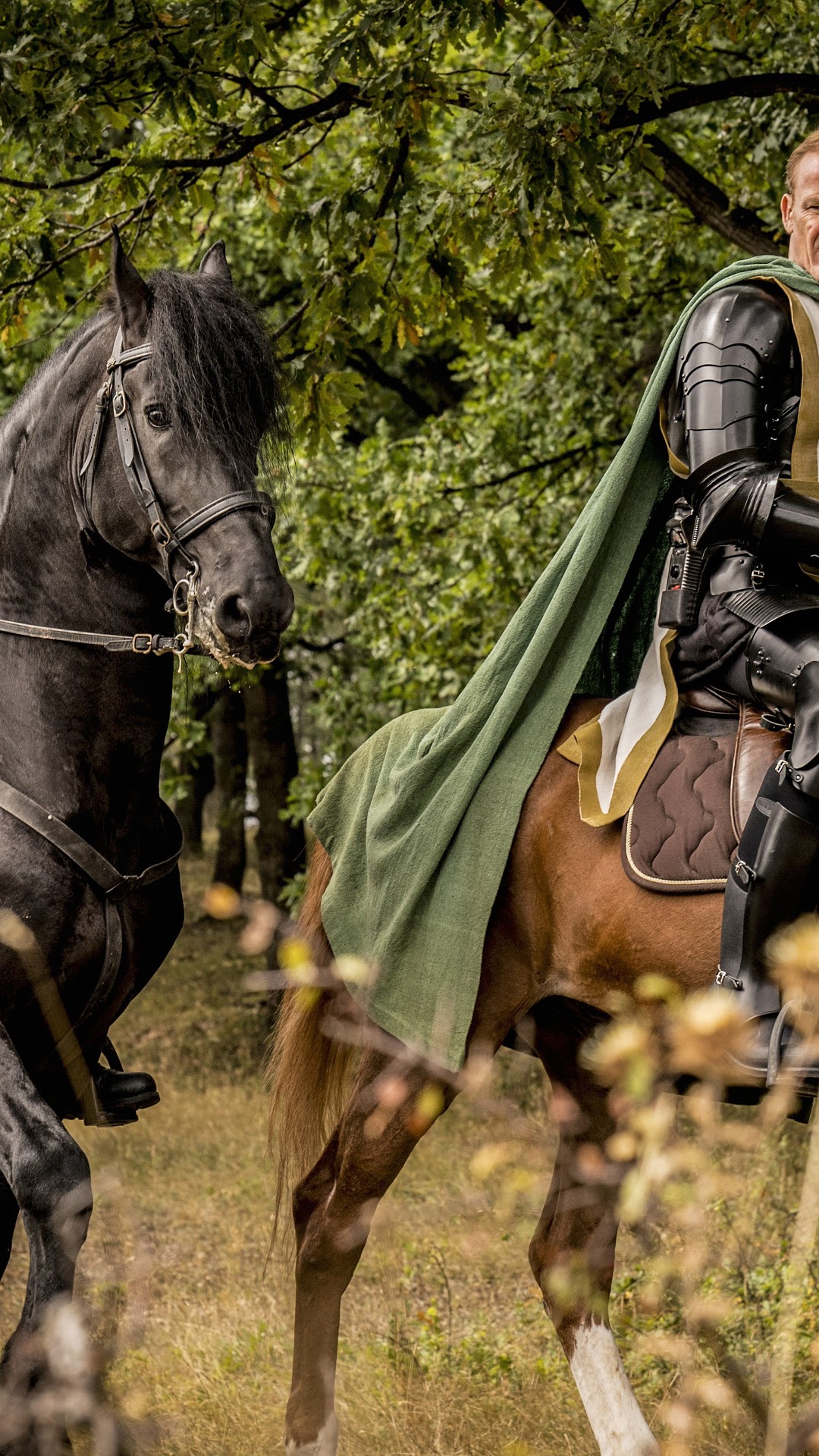 Hellboy on horseback in a forest HD Phone Wallpaper