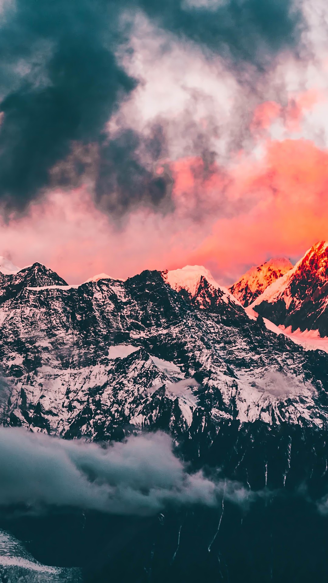 Snow-capped mountains under a colorful sunset sky HD Phone Wallpaper
