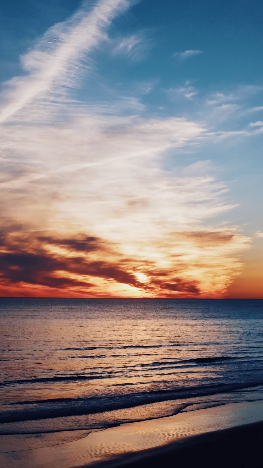Seascape with Sunset over the Ocean and Beach HD Phone Wallpaper
