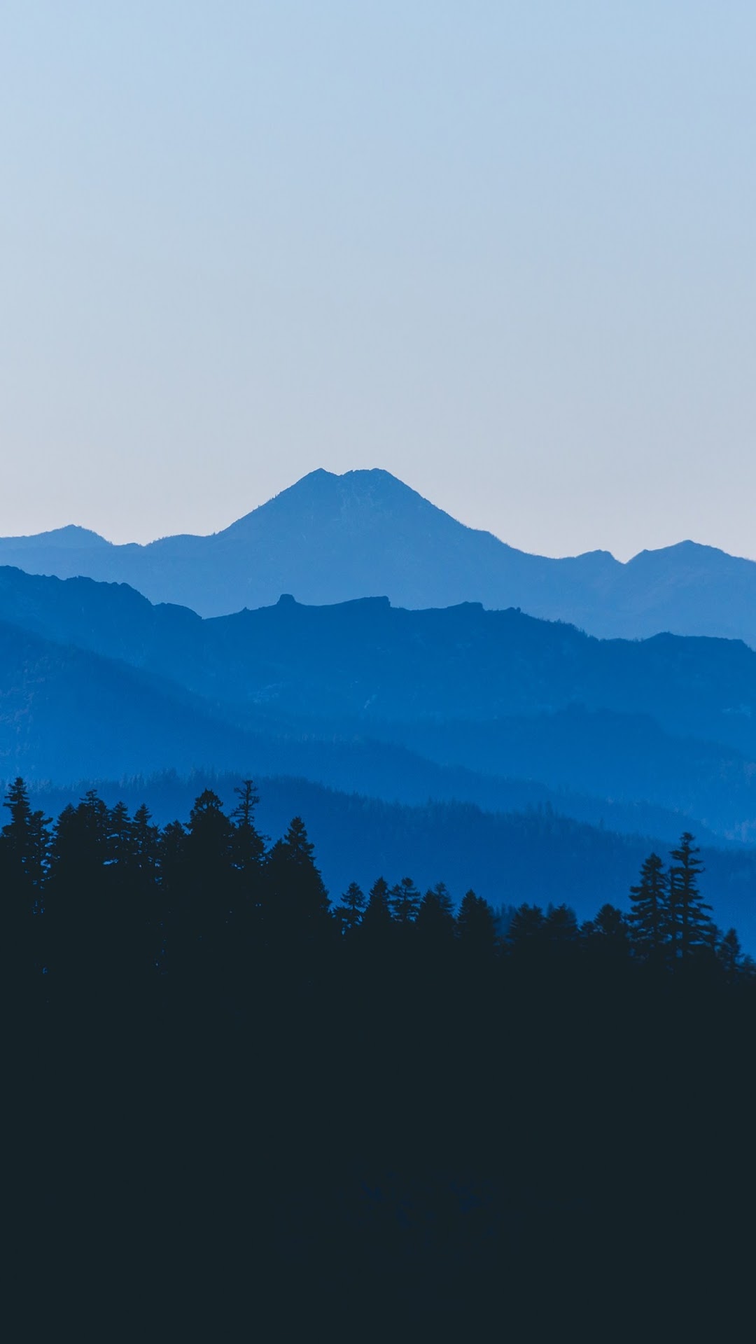 Blue mountain ranges and forest silhouette HD Phone Wallpaper